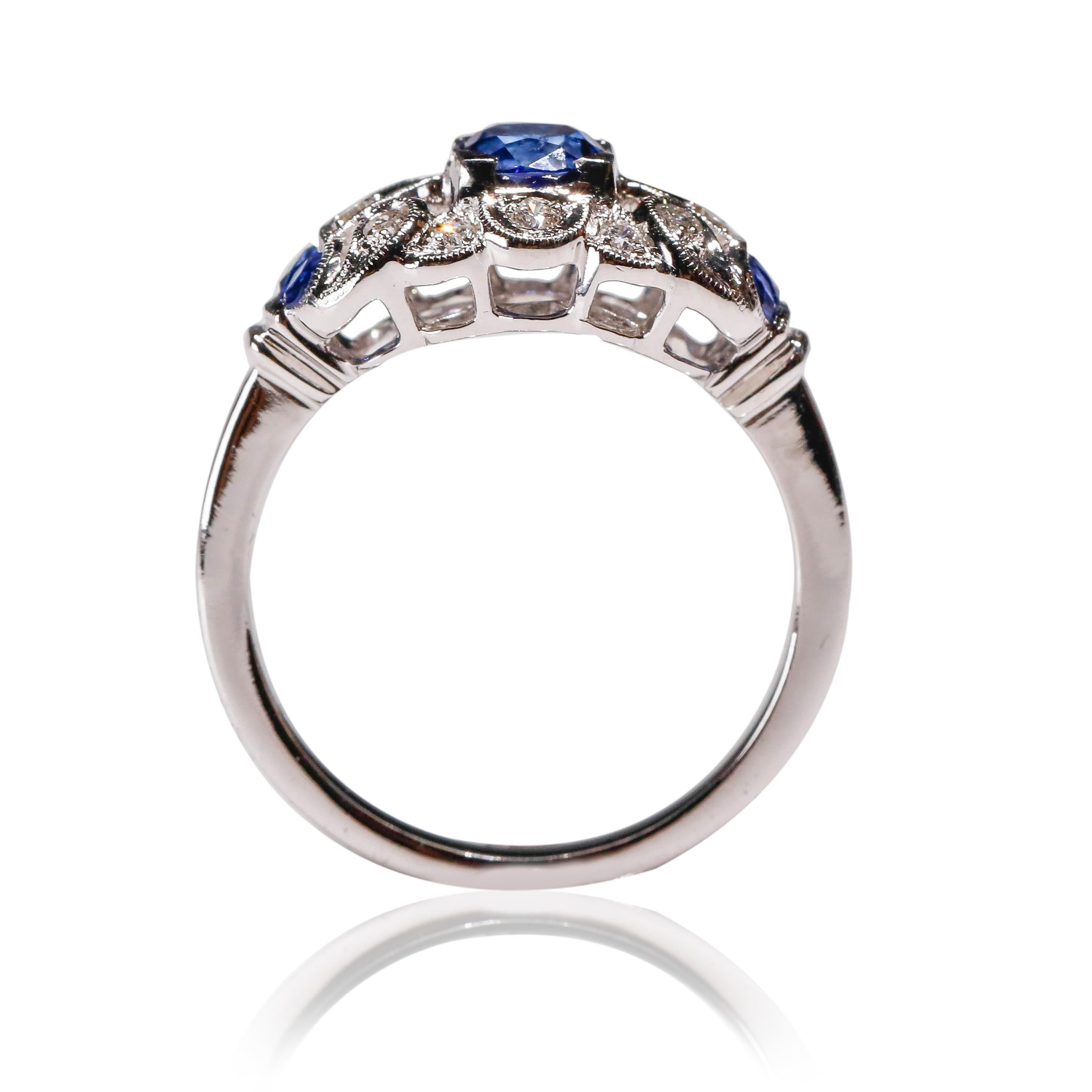 18 Karat White Gold 0.93 Ct Art Deco Style Blue Sapphire Diamond Halo Ring

Crafted in 18 kt White Gold, this Unique design showcases a Blue Sapphire 0.93 TCW Oval shaped Sapphire, set in a halo of round-cut mesmerizing diamonds, Polished to a