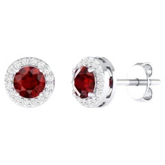 Clous d'oreilles solitaires en or blanc 18 carats avec rubis de 0,96 carat