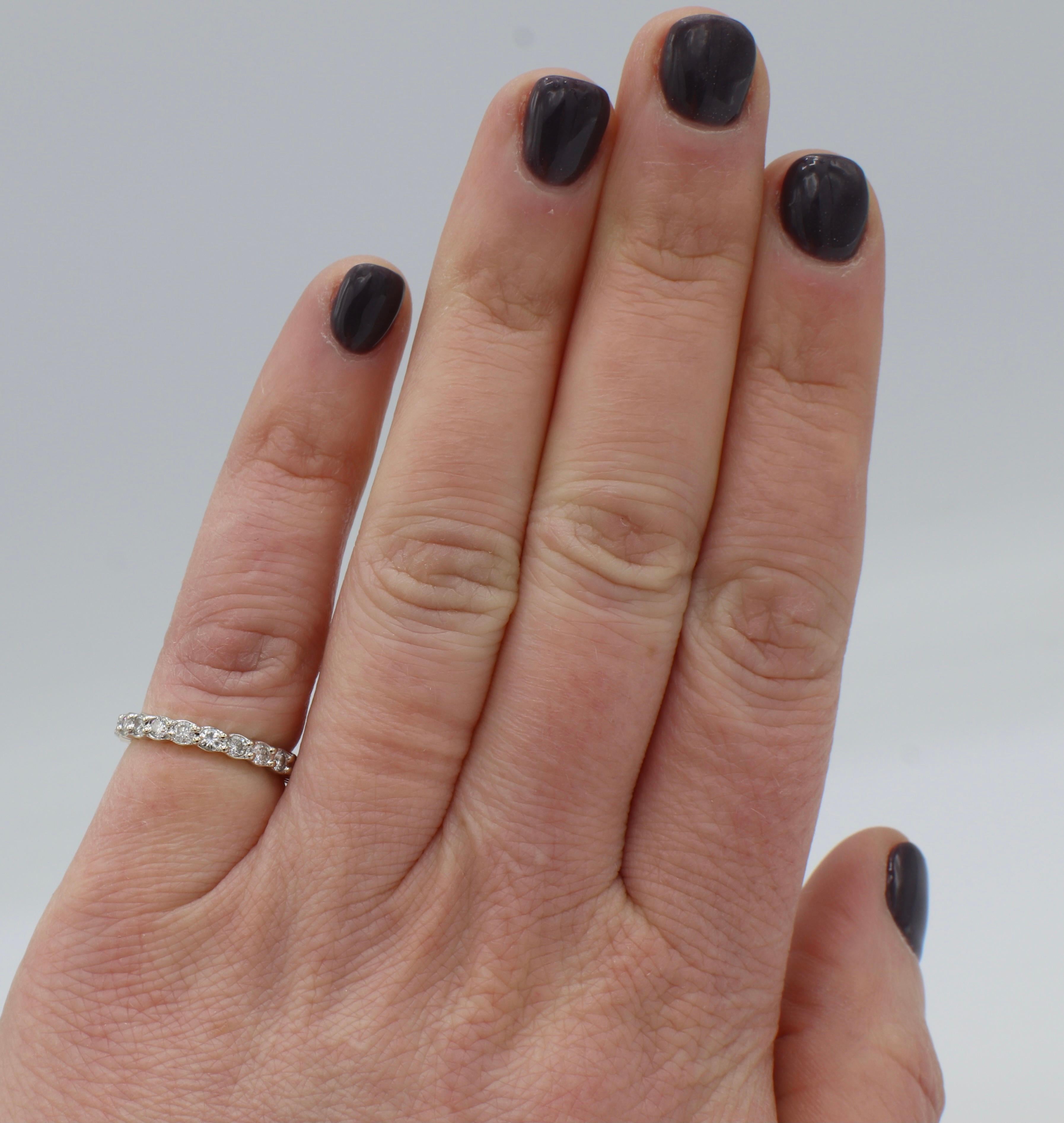 2 carat eternity band on finger