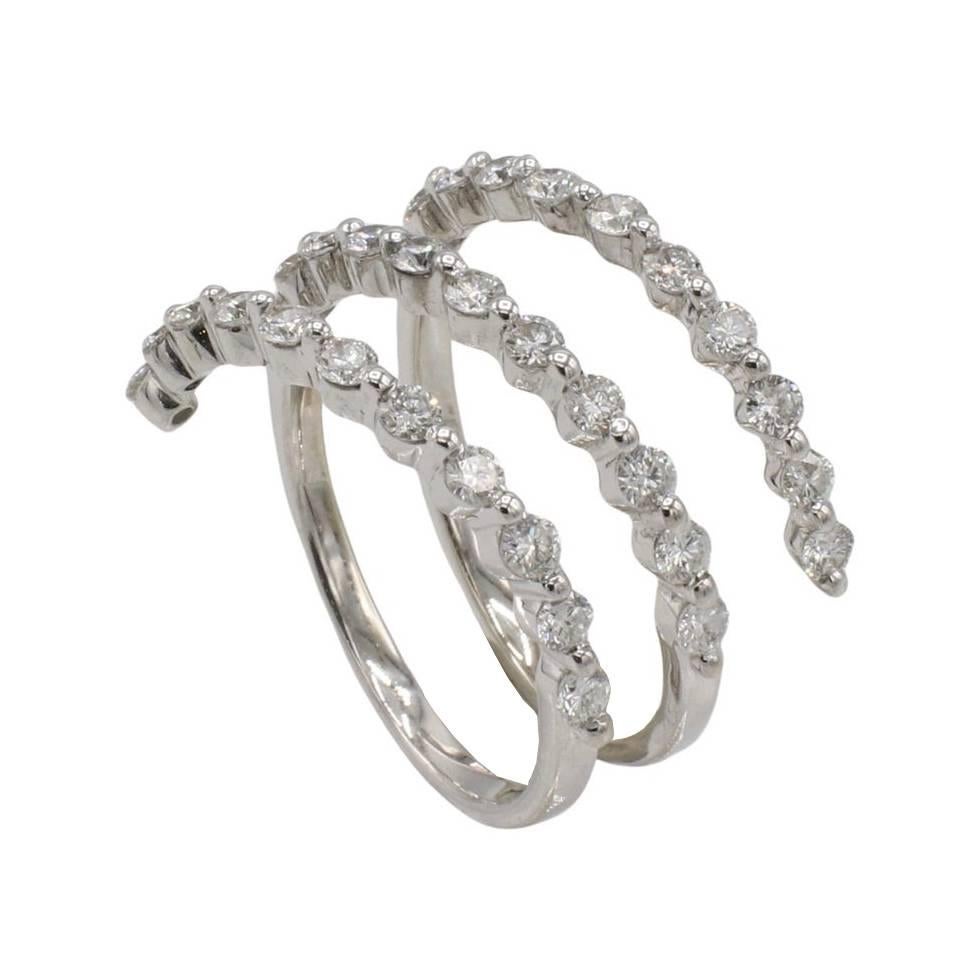 Flex-Ring, 18 Karat Weißgold 1,00 Karat natürlicher Diamant Spiral Flex-Ring 
Metall: 18k Weißgold
Gewicht: 4.49 Gramm
Diamanten: 33 runde Naturdiamanten ca. 1,00 G SI
Größe: 7 (US)
Breite: 13,5 mm an der breitesten Stelle (flexibel) 
ATD F35000224
