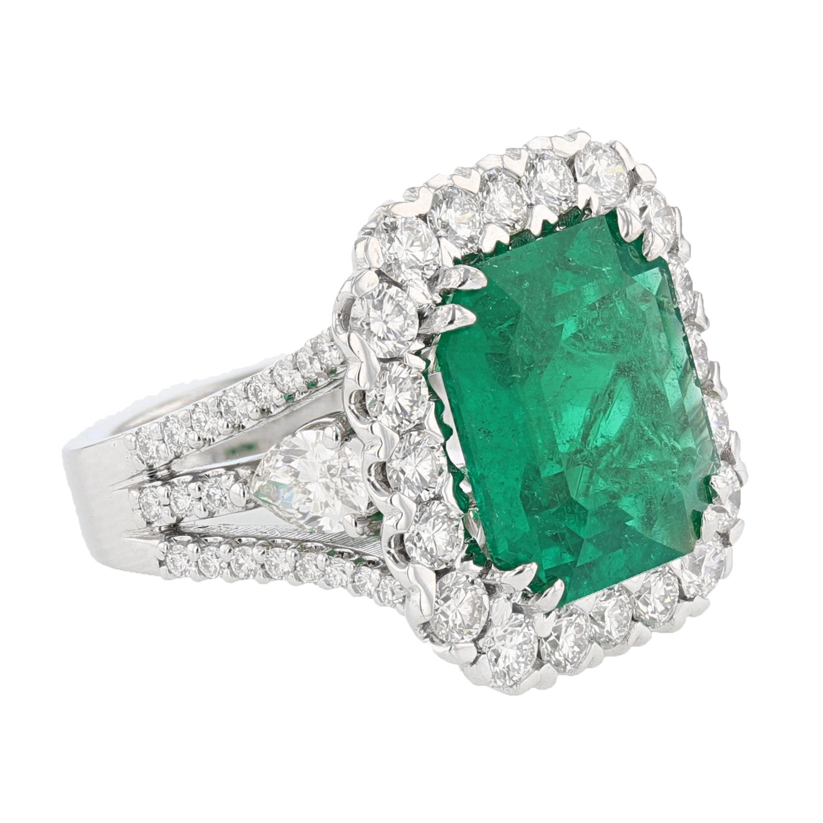 This ring is made in 18 karat white gold and features a 10.08ct Colombian emerald cut emerald with a Gia certificate. The Certificate number is 
