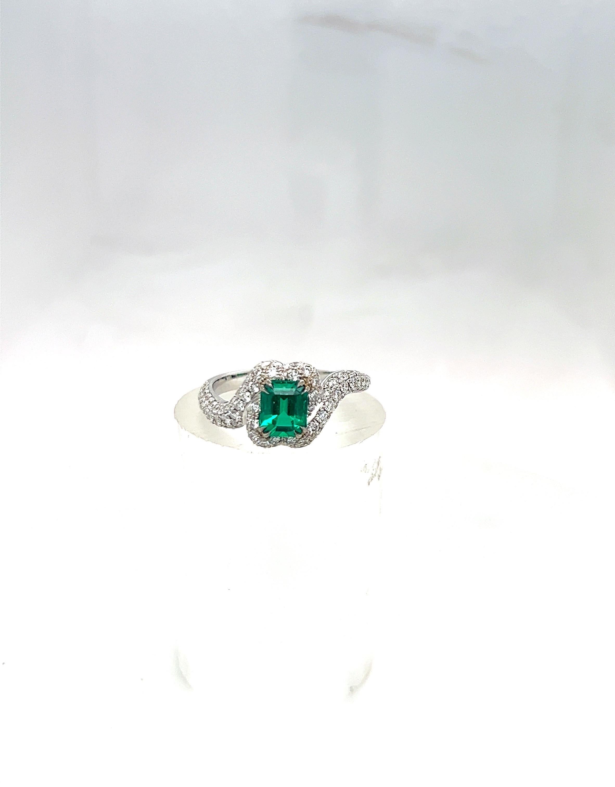 Modern 18 Karat White Gold 1.01 Ct Colombian Emerald and 1.01 Ct. Diamond Ring For Sale