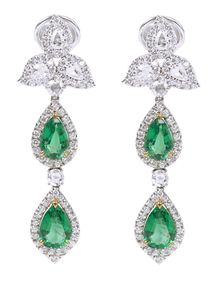 Pear Cut 18 Karat White Gold 10.46 Carat Natural Emerald and Diamond Dangle Earrings For Sale