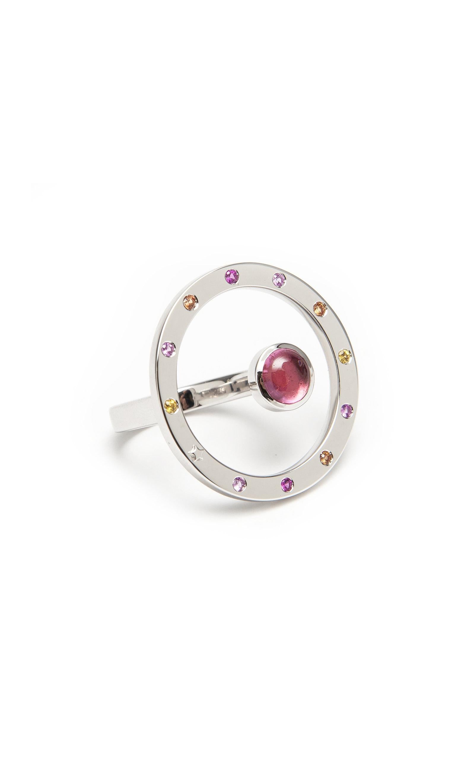 nspired by the concept of time, Anna Maccieri Rossi's 'ORA Ring' features a circular silhouette with tourmaline cabochon at center. The multicolored sapphires and a gold star at 8 o'clock around the rim mark each hour of the day.
PRODUCT