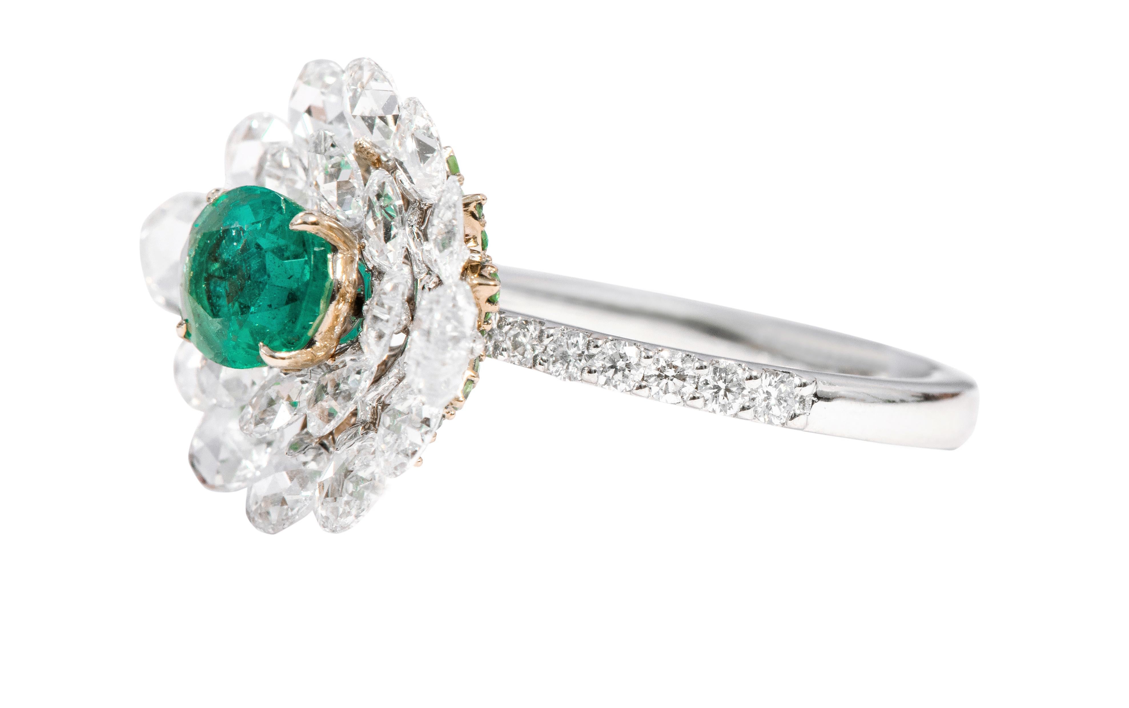 18 Karat White Gold 1.10 Carat Natural Emerald and Diamond Rose-Cut Cluster Ring

This impeccable vibrant green emerald and diamond rose-cut solitaire cocktail ring is fascinating. The ring sets itself apart with the exquisite solitaire oval emerald