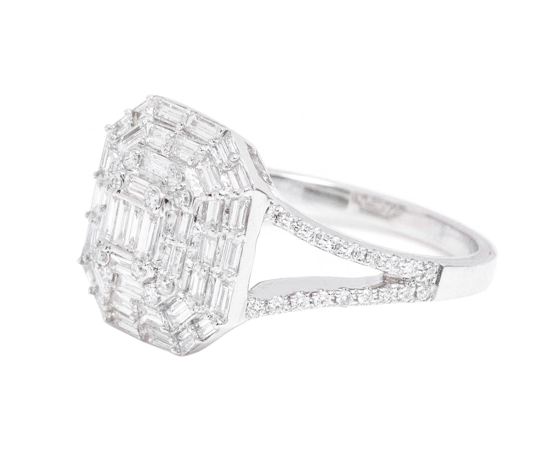 18 Karat White Gold 1.12 Carat Diamond Contemporary-Style Ring

This incredible emerald cut diamond invisible setting engagement ring is exemplary. The center invisible setting diamond emerald cut is a crafty design wherein 5 smaller baguette cut