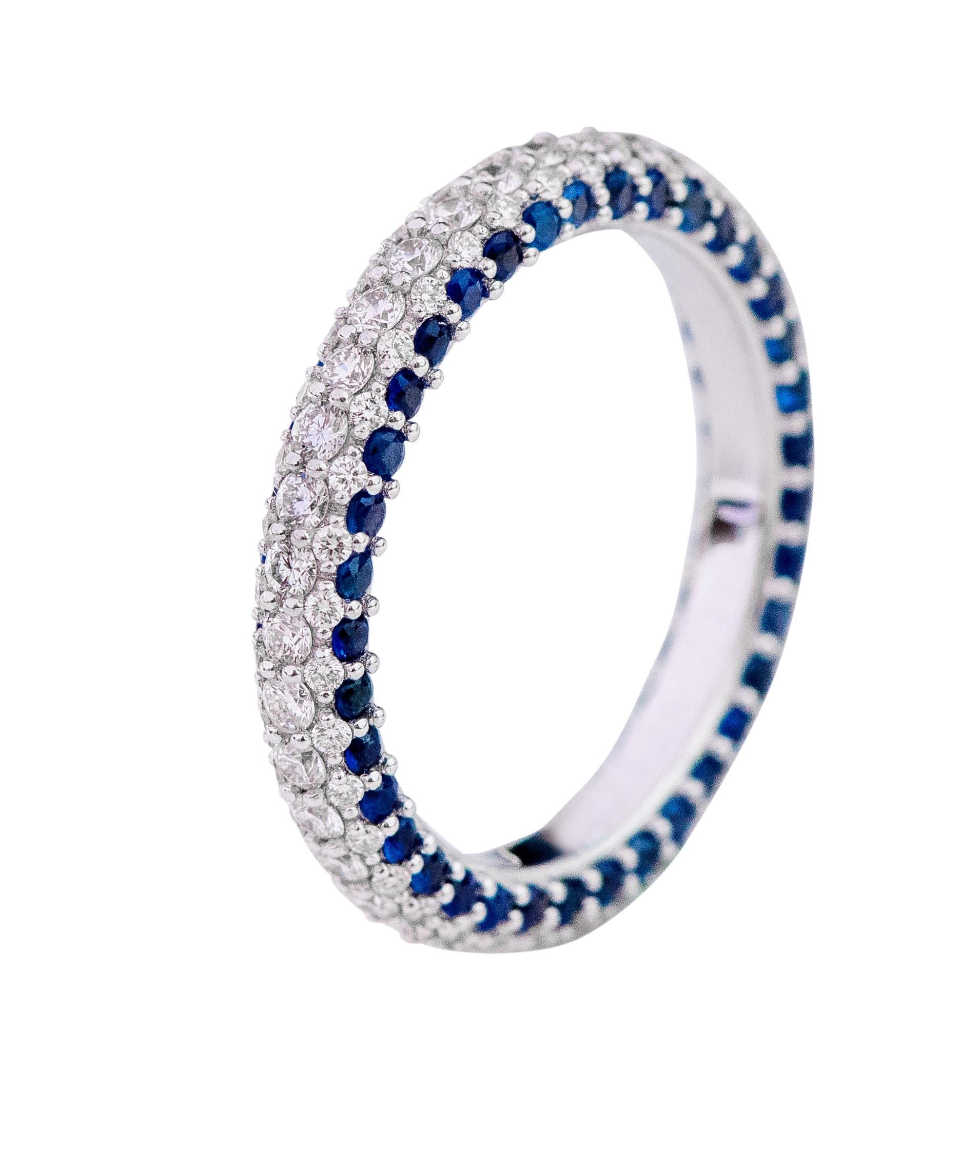 18 Karat White Gold 1.16 Carat Round-Cut Sapphire and Diamond Eternity Band Ring

This profound eternity diamond and vibrant blue sapphire band is magnificent. The refined setting of brilliant round solitaire diamonds with a continuous flow of