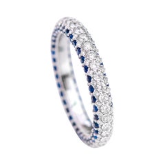 Anneau d'éternité en or blanc 18 carats avec saphir taille ronde de 1,16 carat et diamants