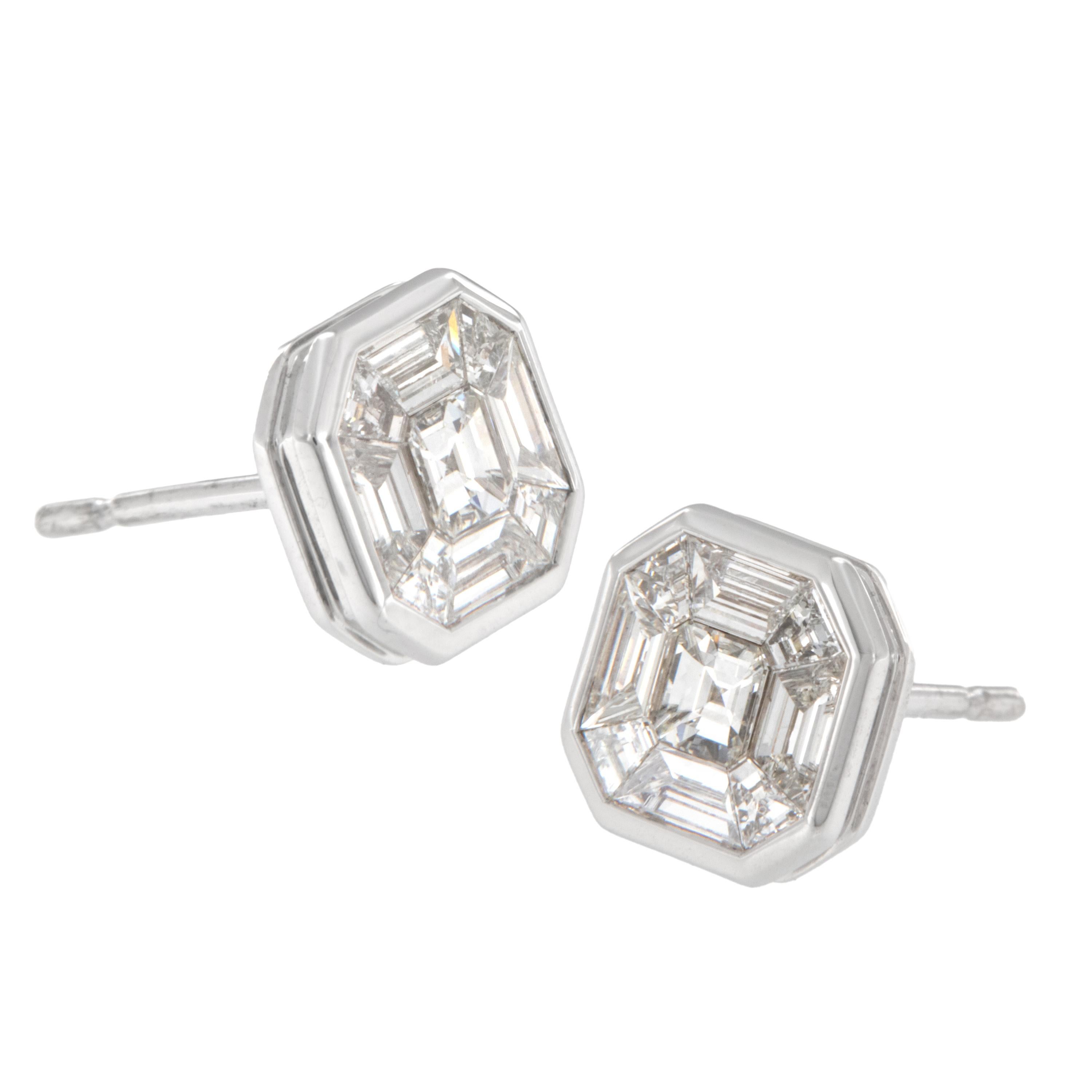 Expertly crafted fine 18 karat white gold stud earrings done in Asscher Cut style with invisible set Collection Quality Diamonds (VVS - VS clarity , E-F color) for the Royal look. In 1902 Joseph Asscher created the original Asscher cut diamond,