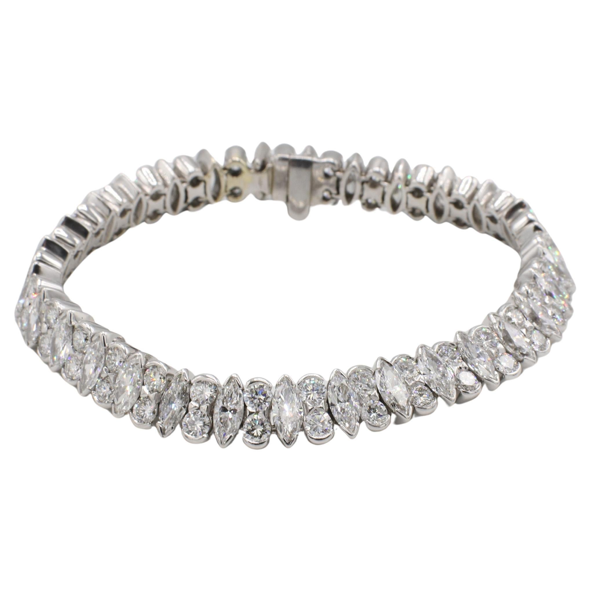 Bracciale a due file in oro bianco 18 carati con diamanti naturali da 13,00 carati 
Metallo: oro bianco 18 carati
Peso: 31.5 grammi
Diamanti: Circa 13,00 CTW G-H VS-SI1 di diamanti naturali marquise e rotondi 
Lunghezza: 7 pollici
Larghezza: 8