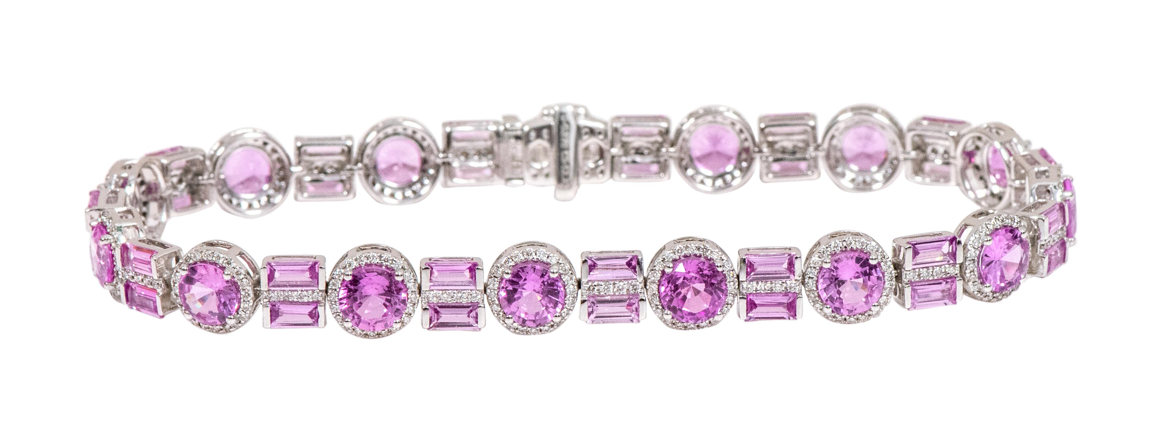 18 Karat White Gold 13.23 Carat Pink Sapphire and Diamond Tennis Bracelet

This incredible Fuschia pink sapphire and diamond tennis bracelet is impressive. The solitaire round brilliant cut pink sapphires are magnificently surrounded with a pave set