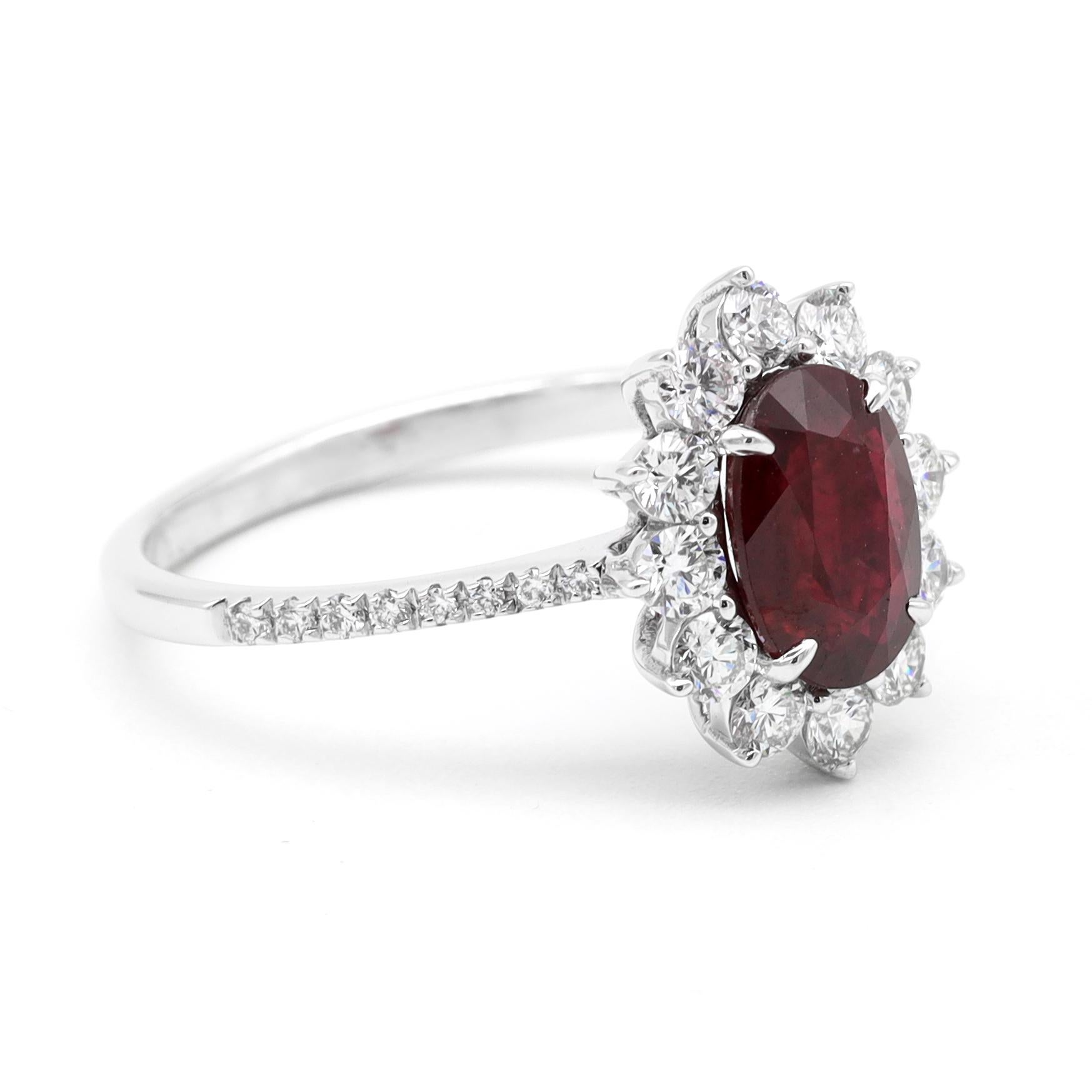 18 Karat White Gold 1.35 Carat Deep Red Ruby Oval-Cut and Diamond Cluster Ring

This classic scarlet red ruby and diamond halo ring is regal. The fantastic vivid ruby oval eagle-prong set is surrounded by the outward-facing open 3-prong set