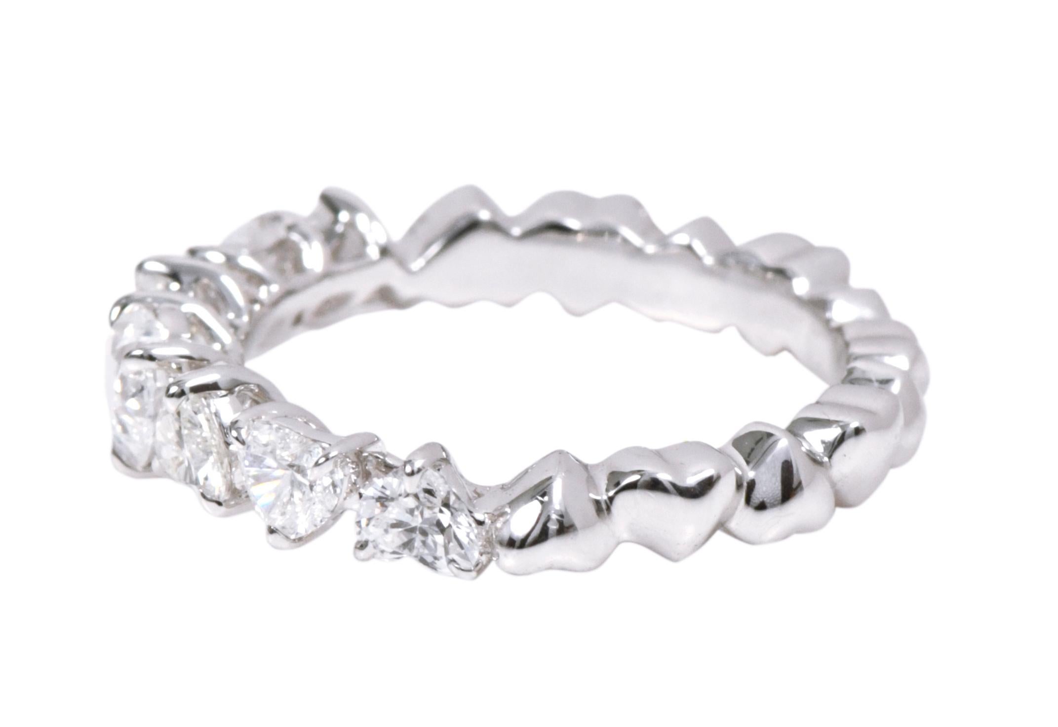 18 Karat White Gold 1.35 Carat Solitaire Heart-Shape Diamond Eternity Band Ring

This eternity heart shaped solitaire diamond half-band is sensational. The solitaire heart shaped diamond in the center highlights the look with the several alternating