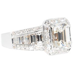 18 Karat White Gold 1.43 ct Emerald Cut Center Engagement Ring...2.72 carats TW