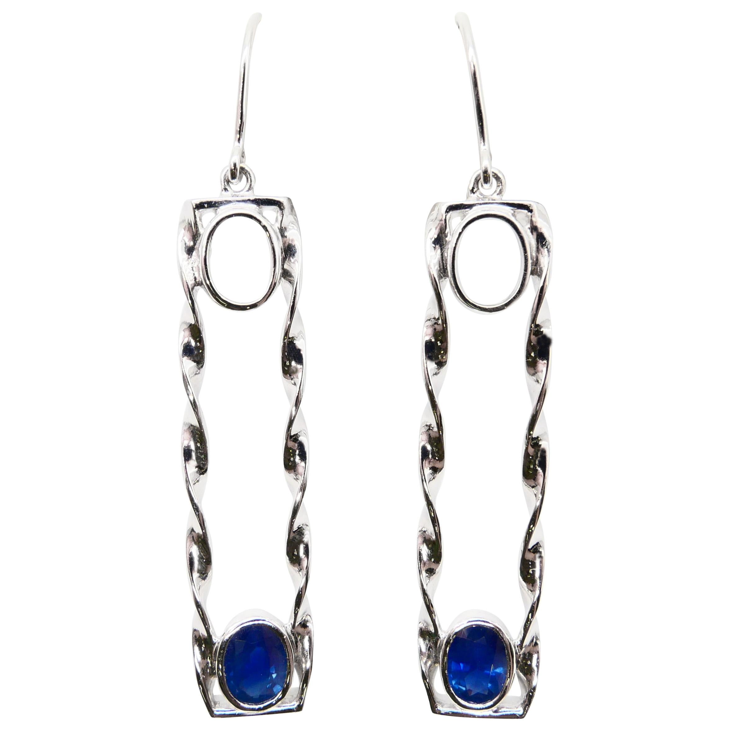 18 Karat White Gold 1.45 Carat Blue Sapphire Drop Twist Earrings For Sale