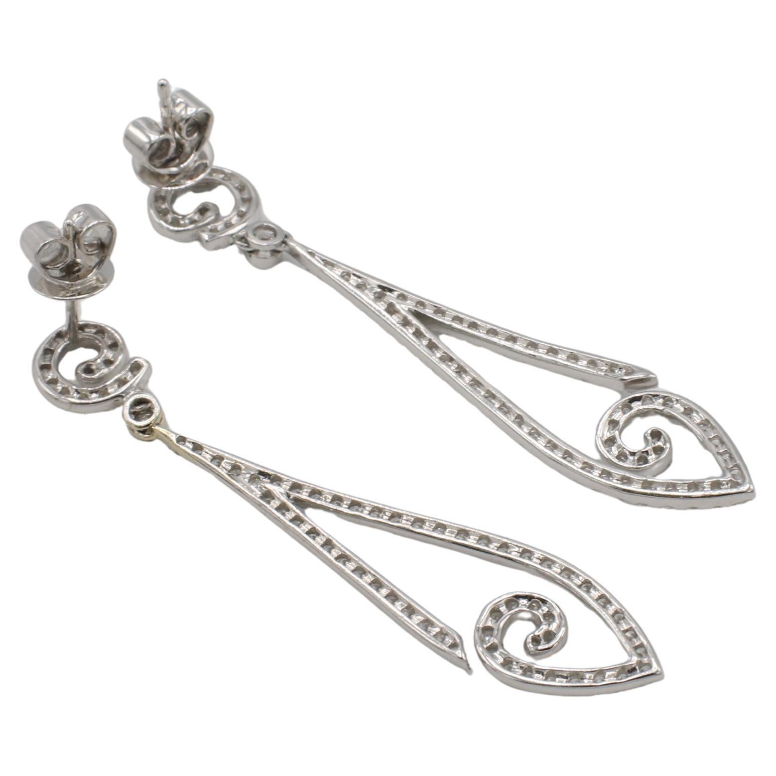 Modern 18 Karat White Gold 1.50 Carat Natural Diamond Dangle Drop Earrings For Sale