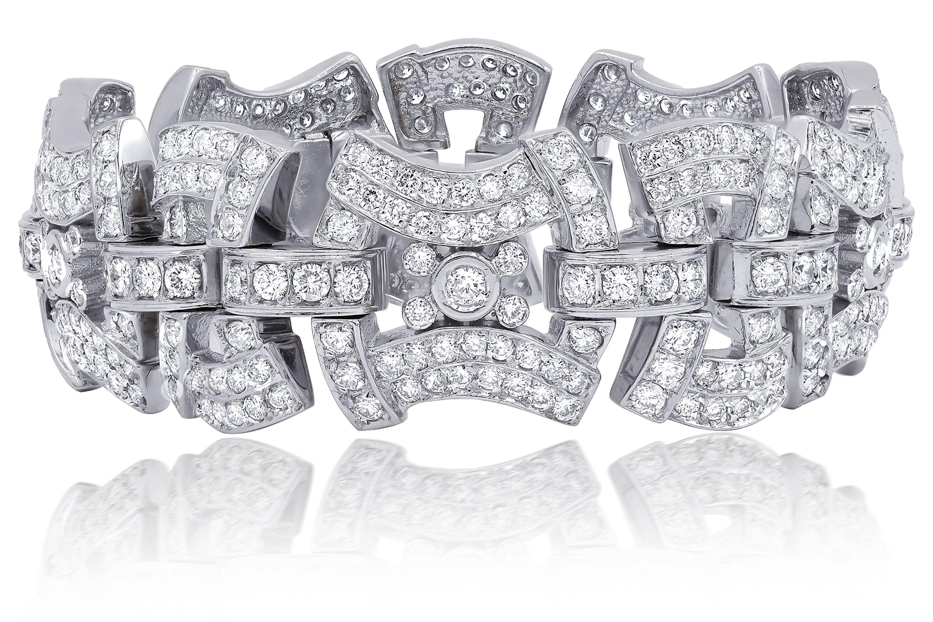 One 18K White gold wide diamond link bracelet features 15 carats of round diamonds. 
Features ideal cut brilliant cut diamonds, colorless. 

