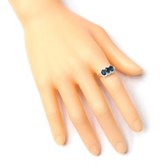 18 Karat White Gold 1.52 Carats Sapphire and Diamond Three-Stone Ring