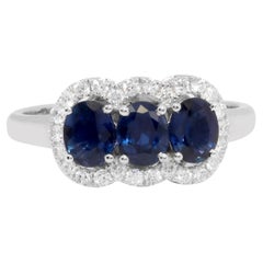 18 Karat White Gold 1.52 Carats Sapphire and Diamond Three-Stone Ring