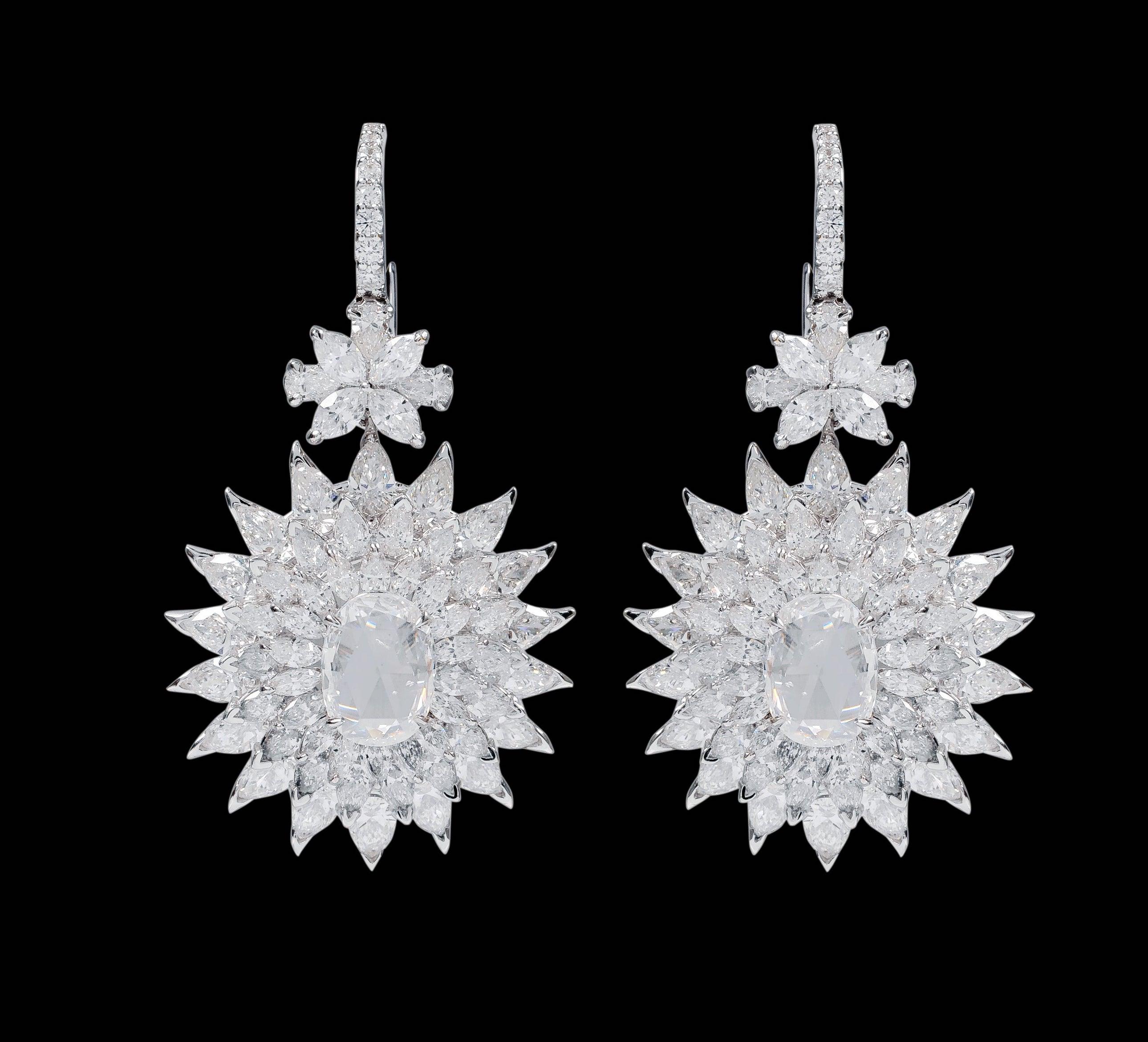 18 Karat White Gold 15.62 Carat Diamond Cocktail Drop Earrings

This complex 5-layer modulation sunburst diamond earring is remarkably brilliant. The design is skillfully crafted with the combination of solitaire marquise and pear diamonds in the