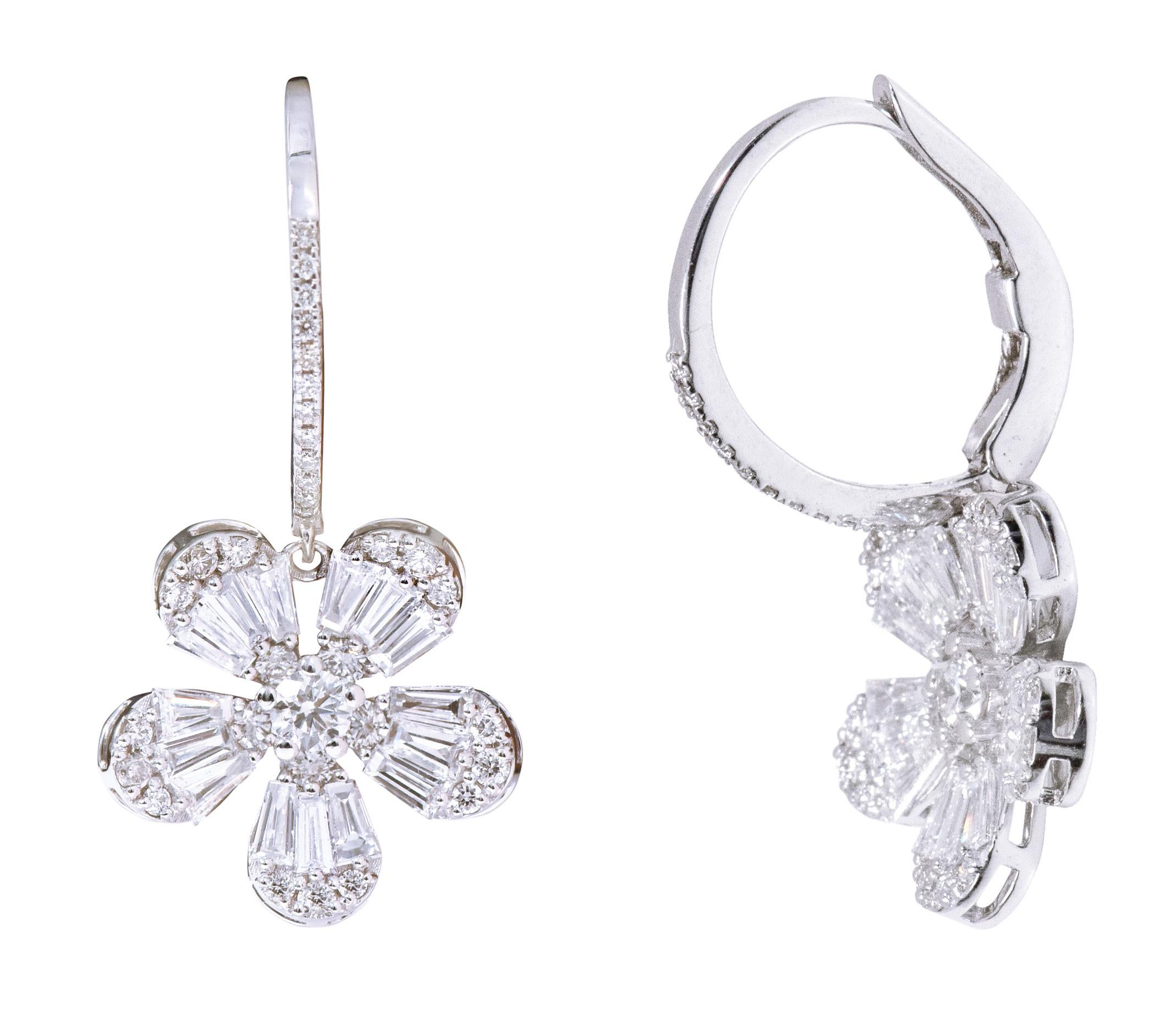 18 Karat White Gold 1.71 Carat Diamond Flower Drop Earrings

This glorious invisible set petal shaped diamond floral hanging earring is magnificent. The invisible diamond petal shape in white gold setting is a crafty design wherein 3 smaller tapered