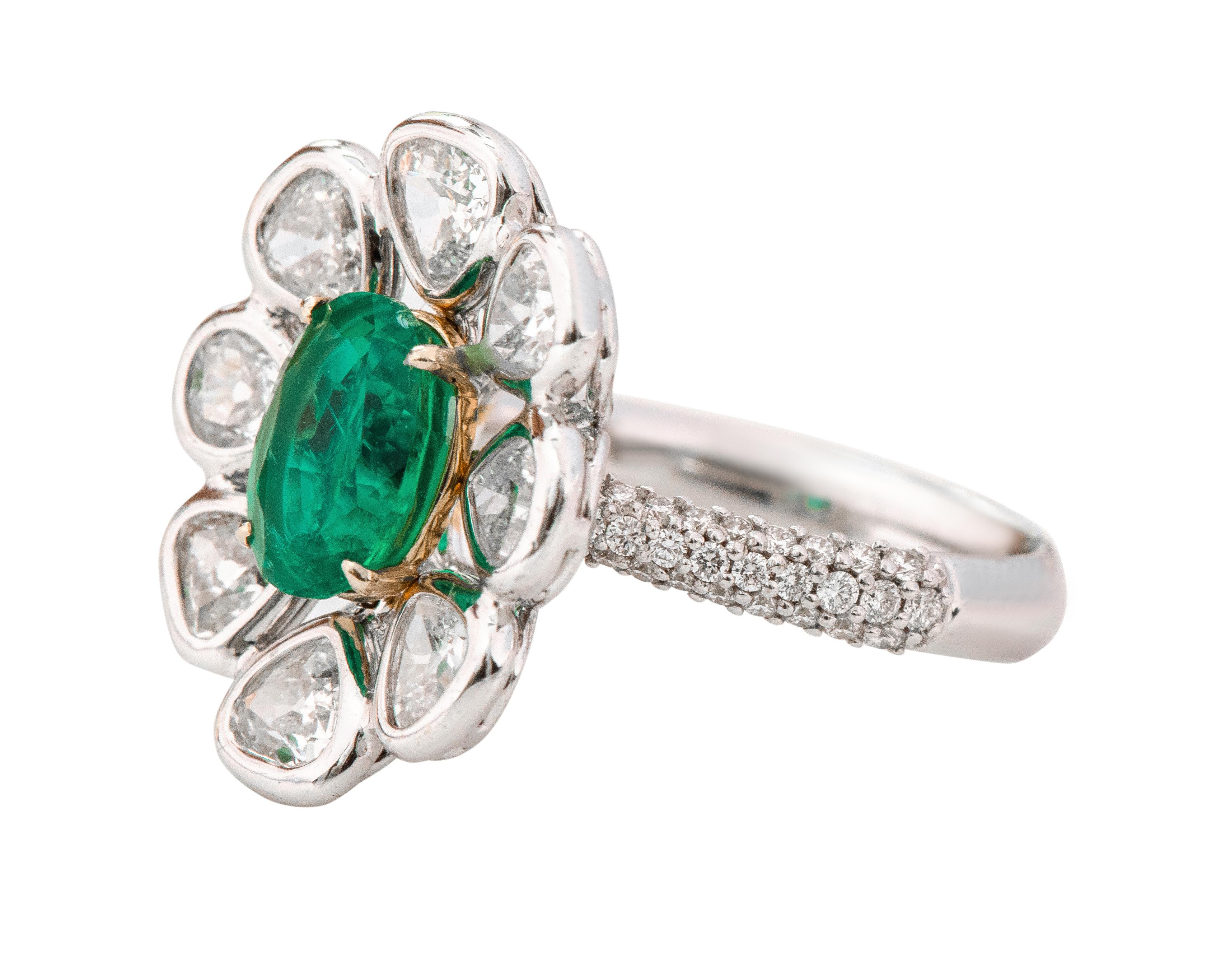 18 Karat White Gold 1.80 Carat Natural Emerald and Diamond Masterpiece Ring

This magnificent vivid green emerald and diamond solitaire ring is sensational. The solitaire emerald oval in yellow gold eagle prong setting is heightened by the