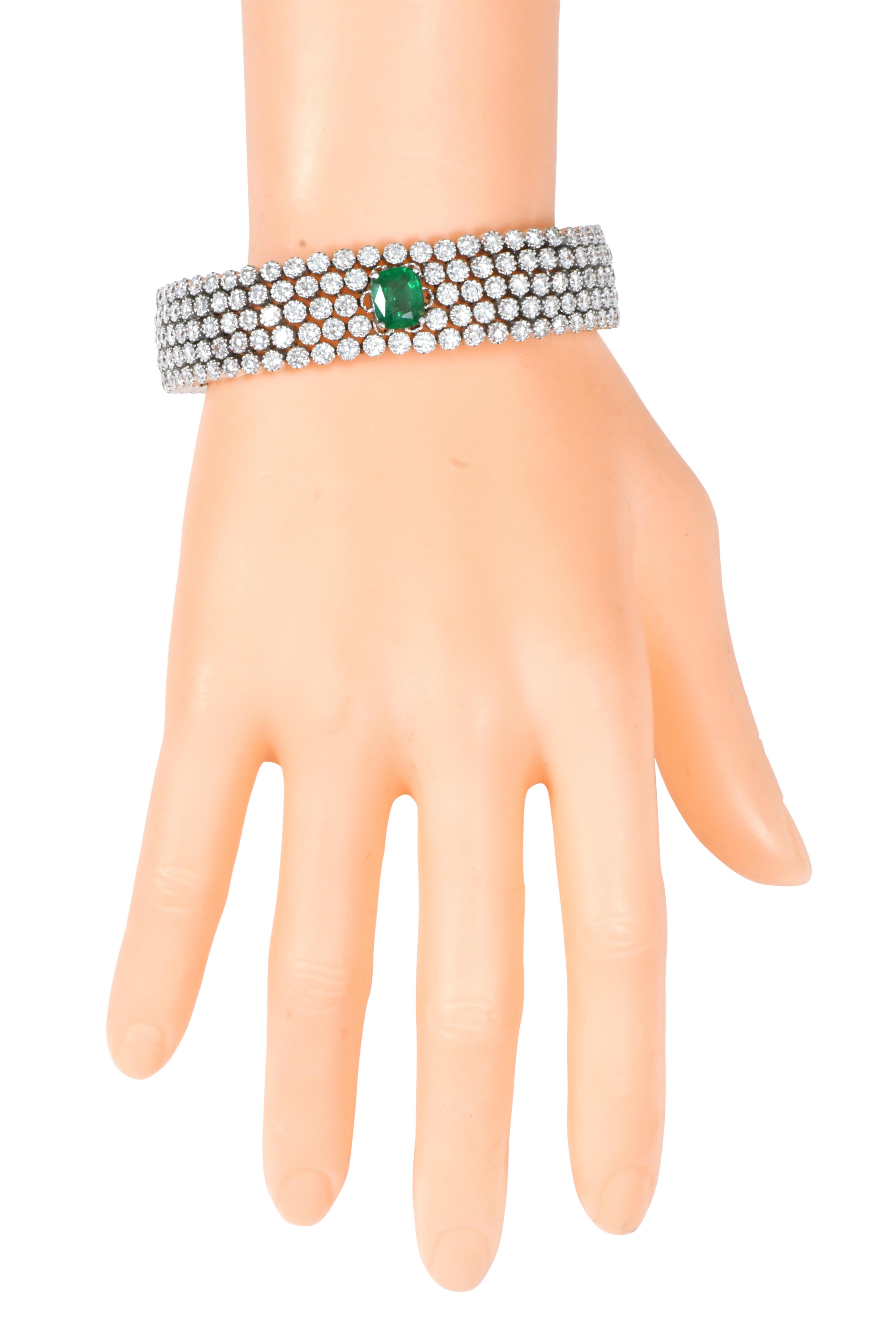 18 Karat White Gold 19.13 Carat Diamond and Emerald Contemporary Bracelet

What if there was a magic spell to charm everything up and make you look like a gorgeous diva. Well, worry no more as we have a very special piece of jewelry for you that
