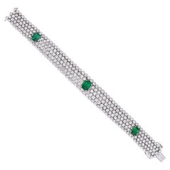 Bracciale contemporaneo in oro bianco 18 carati con diamante e smeraldo da 19,13 carati