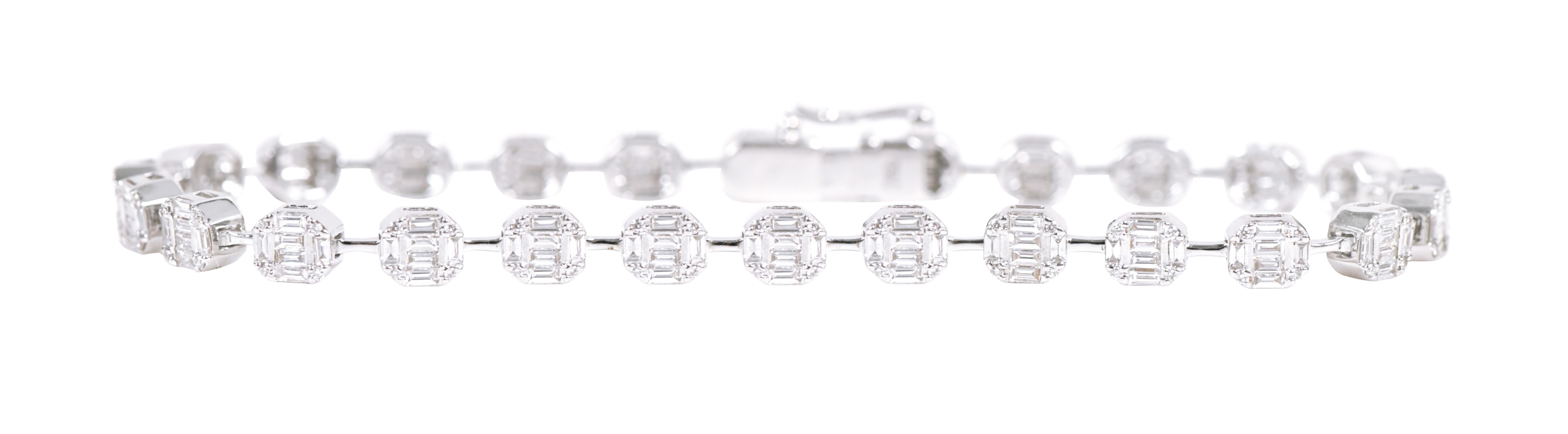 18 Karat White Gold 1.92 Carat “Invisible-Set” Diamond Tennis Bracelet

Versatile, ethereal, and perfectly modern, this radiant design features a unique combination of finely picked diamonds. Set intricately in a simple yet majestic style, the