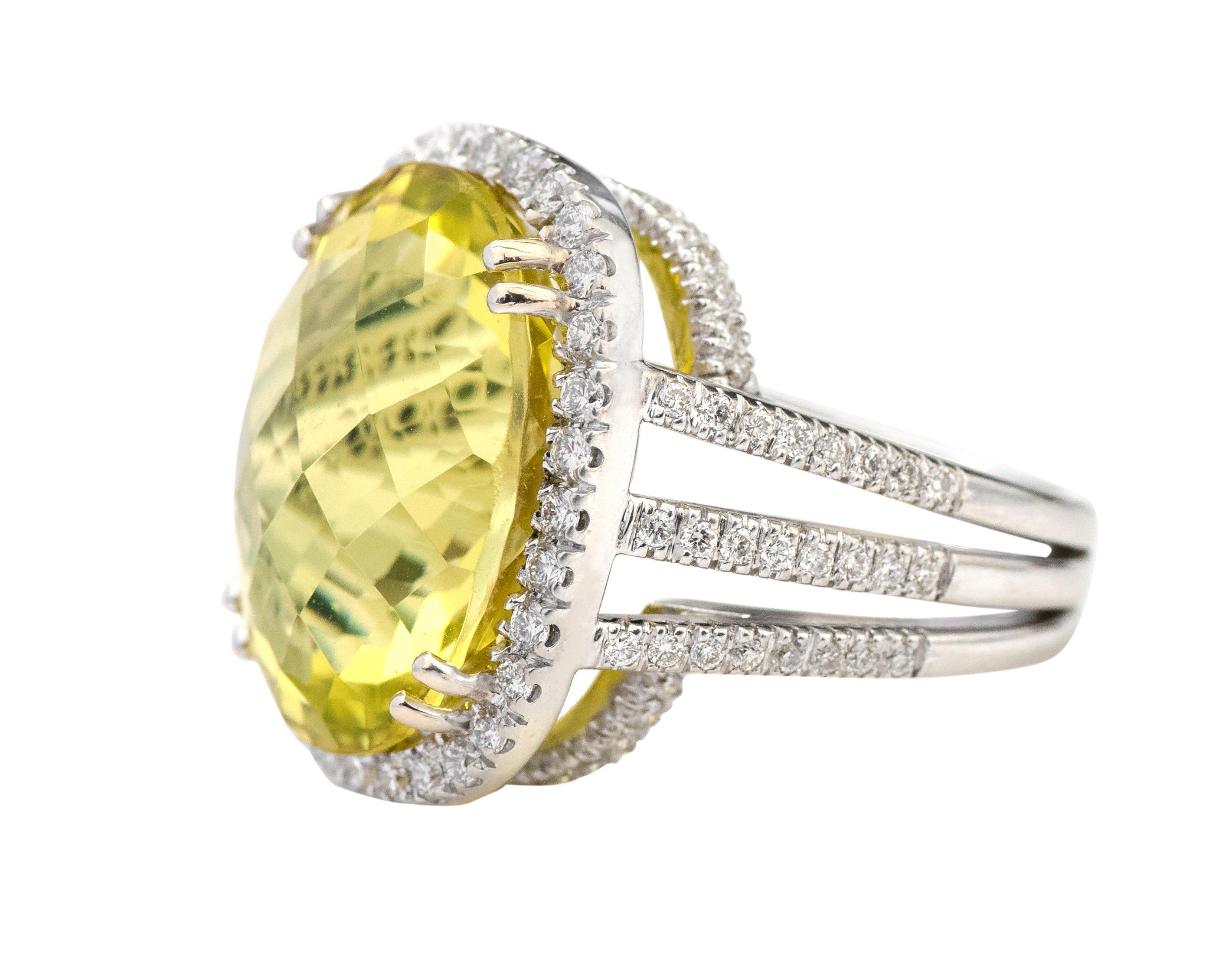 18 Karat White Gold 19.20 Carat Oval-Cut Lemon Topaz and Diamond Cocktail Ring

This laguna lemon topaz/quartz and diamond cluster ring is lively. The solitaire cushion-checkered cut lemon quartz in the double-prong setting is accentuated with the