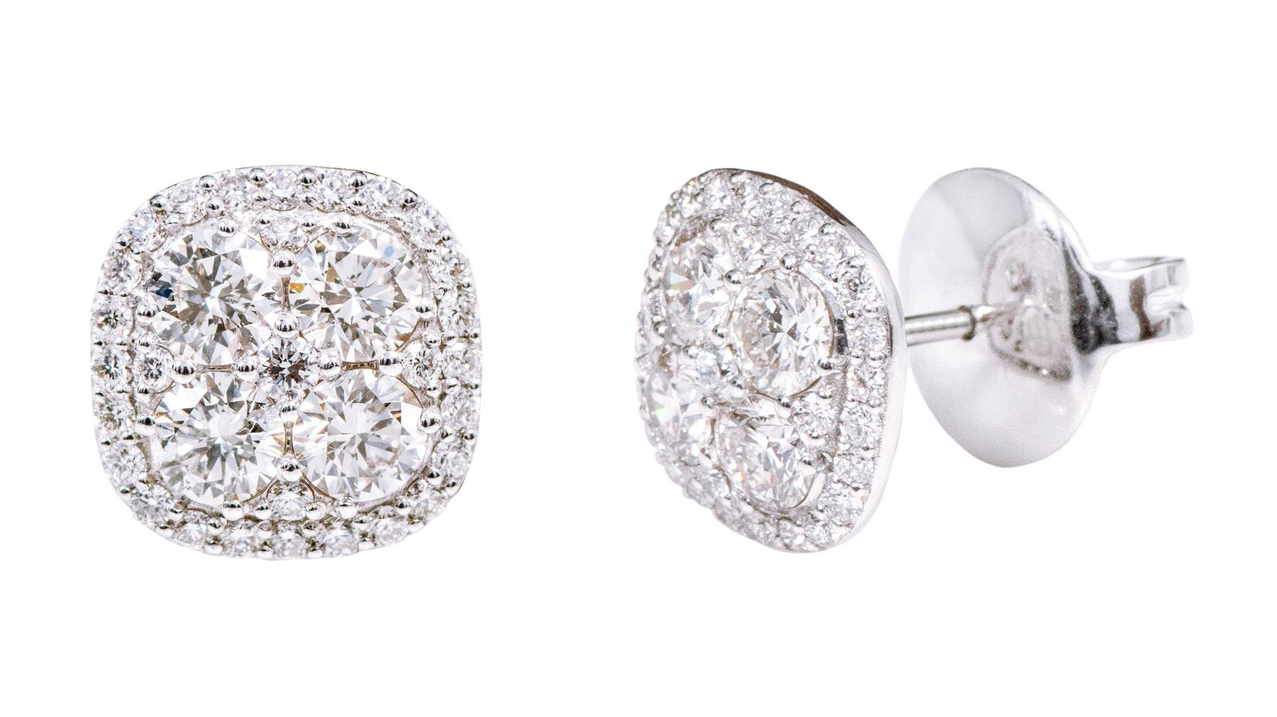 18 Karat White Gold 1.98 Carat Brilliant-Cut Diamond Stud Earrings

This exquisite new style invisible set cushion shaped diamond stud earring is terrific. The cushion cut diamond design formed in solid white gold is impressive wherein 4 solitaire