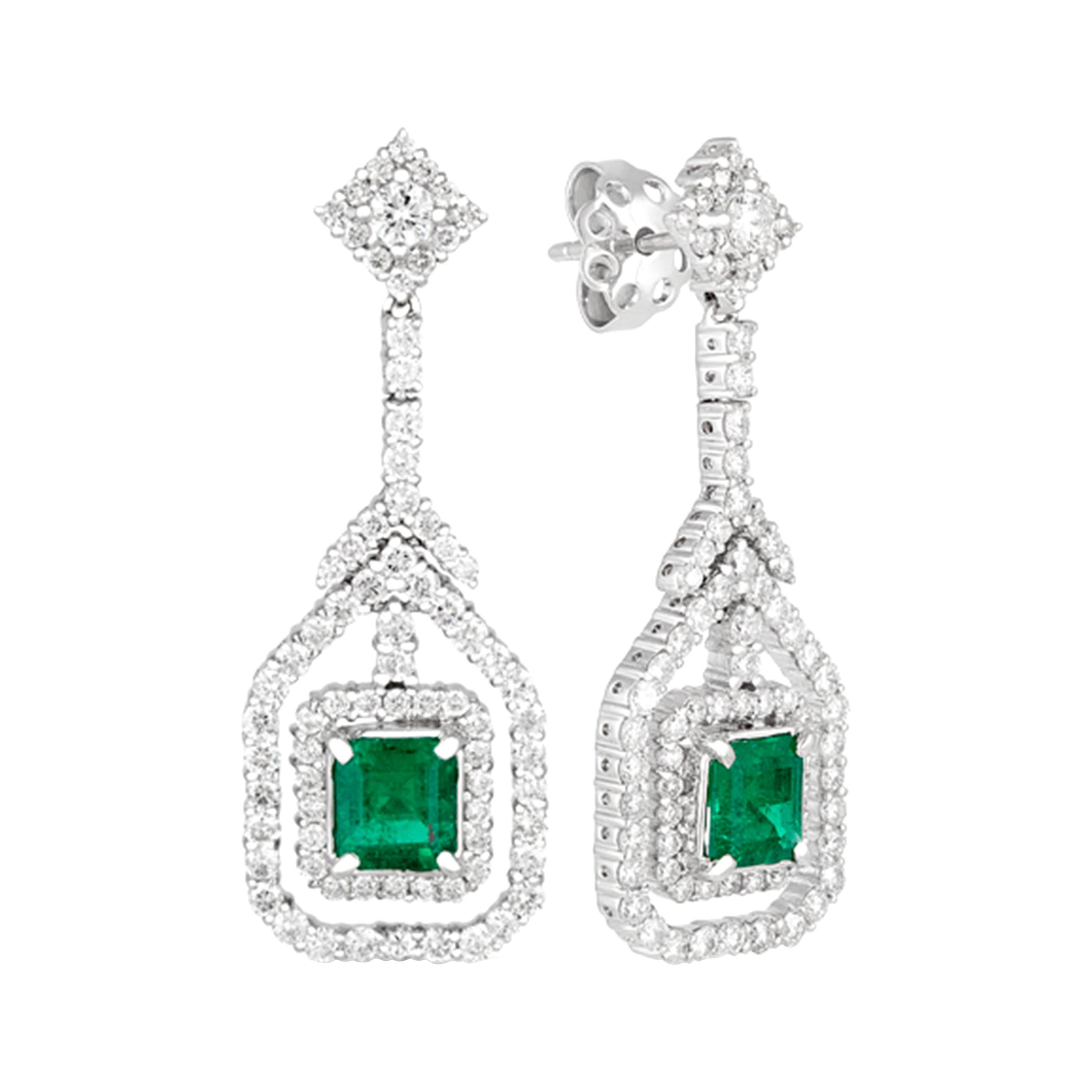 18 Karat White Gold 2 Karat Emerald 0.7 Karat Diamonds Drop Earrings For Sale
