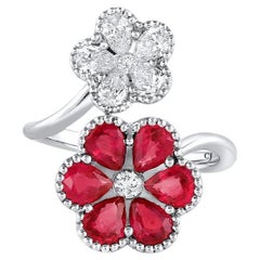 18 Karat White Gold 2.10 Carat Total Weight Ruby and Diamond Flower Bypass Ring