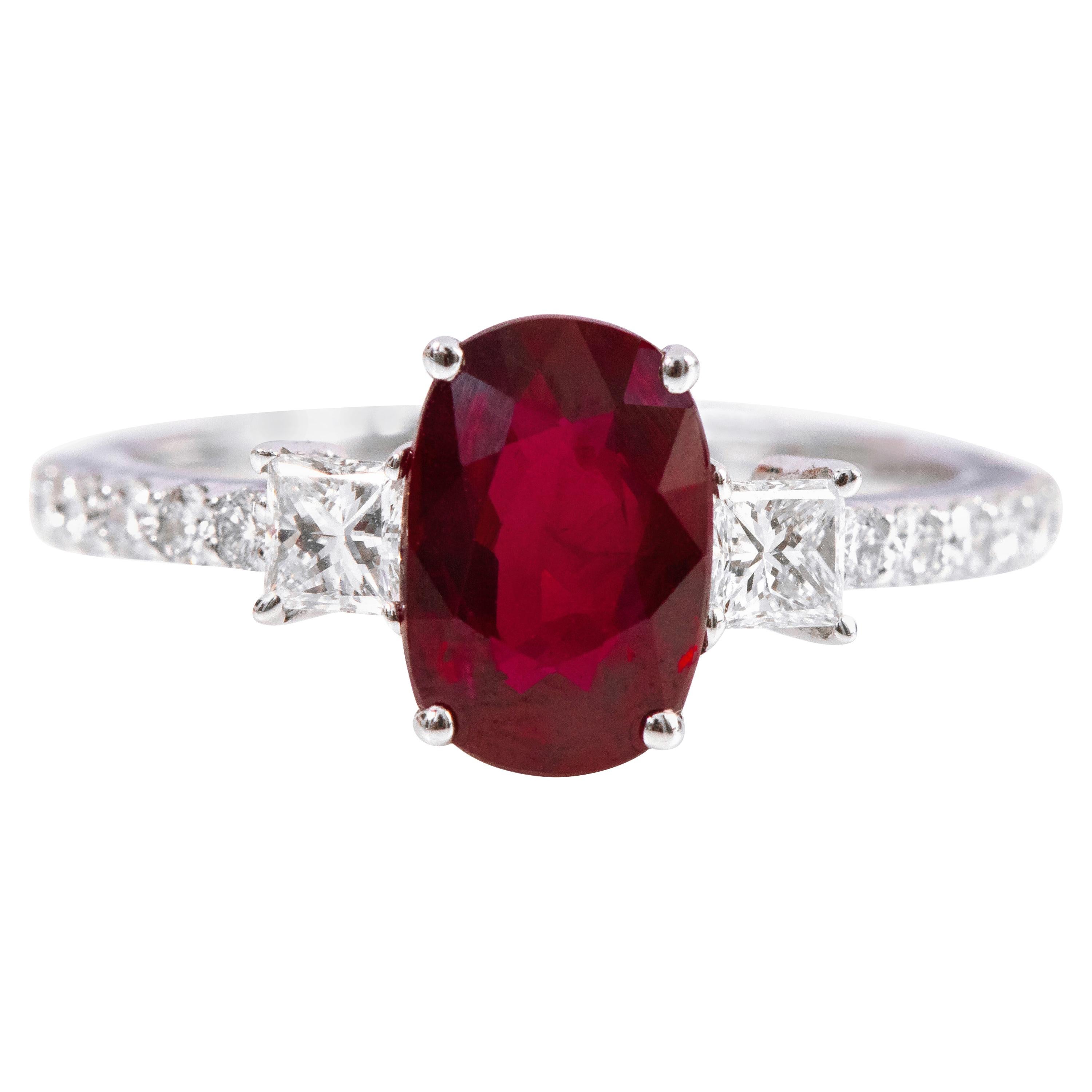 18 Karat White Gold 2.14 Carat Oval-Cut Ruby and Diamond Three-Stone Ring For Sale