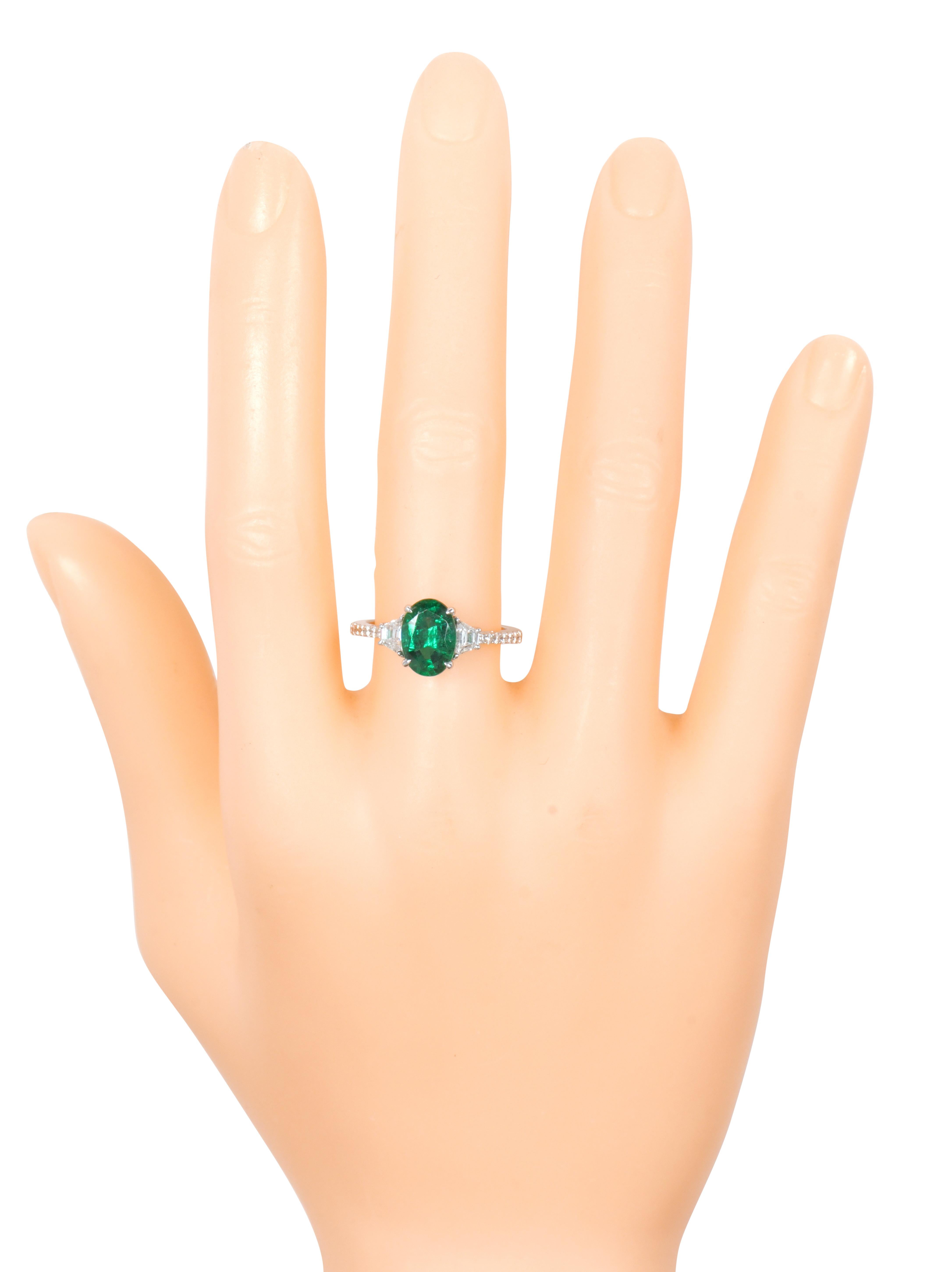 18 Karat White Gold 2.20 Carat Natural Emerald and Diamond Ring

This glorious trinity shamrock green emerald and diamond ring is marvelous. The three-stone trinity ring tells a story by not only representing the said “past, present, and future” but