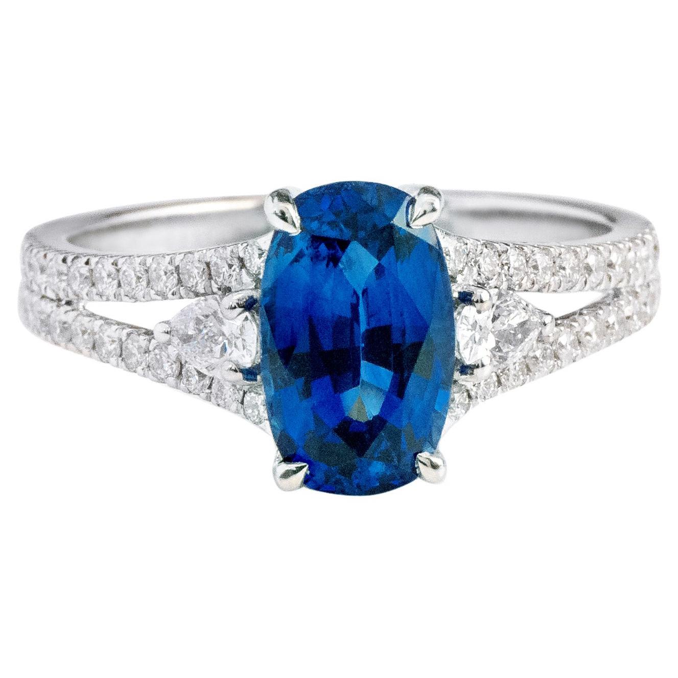 18 Karat White Gold 2.24 Carat Oval-Cut Sapphire and Diamond Three-Stone Ring For Sale