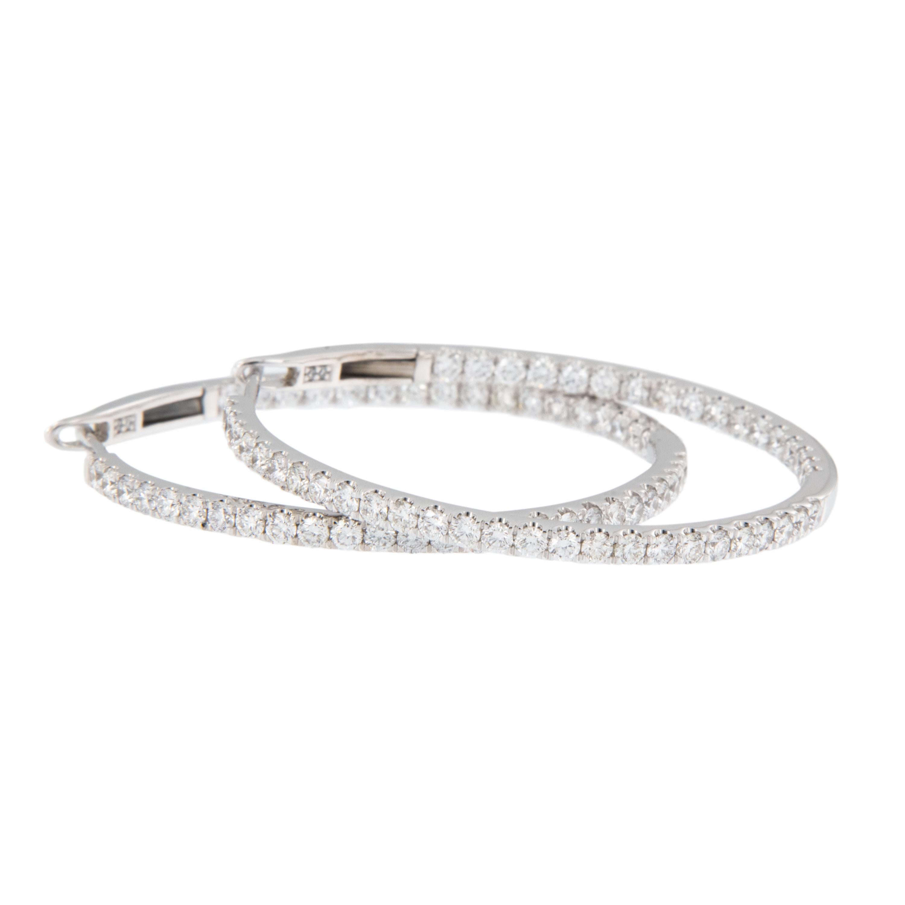 These are the most durable diamond hoops you can get - solid with no hinge to wear out or become loose. Top that off with fine 18 karat white gold and 90 RBC diamonds = 2.28 Cttw being VS - SI1  and F - G - H color  you can't go wrong. Timeless look