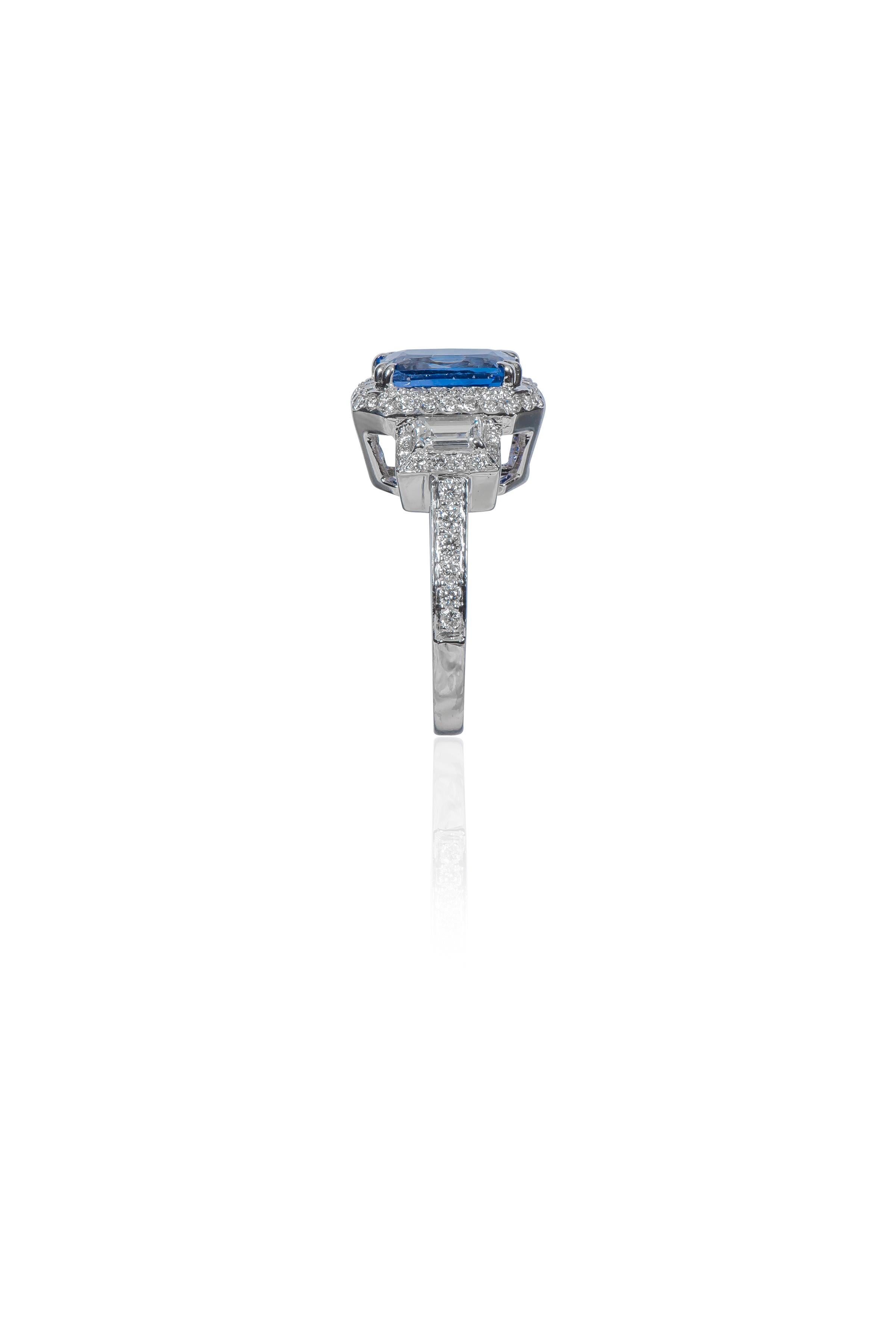 Emerald Cut 18 Karat White Gold 2.36 Carat Sapphire and Diamond Three-Stone Cluster Ring For Sale