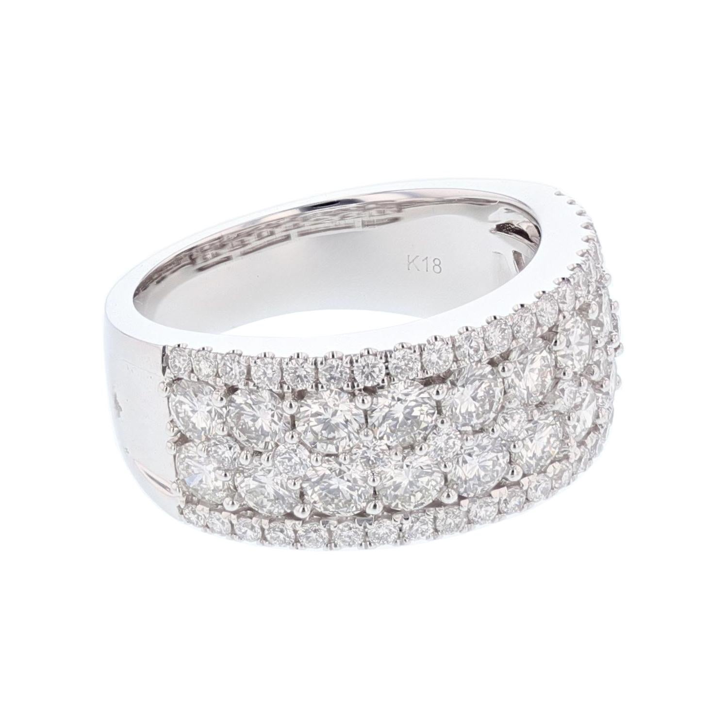 The ring is made in 18k white gold and features 71 round cut diamonds, prong set weighing 2.50cts with a color grade (H) and clarity grade (SI2). 