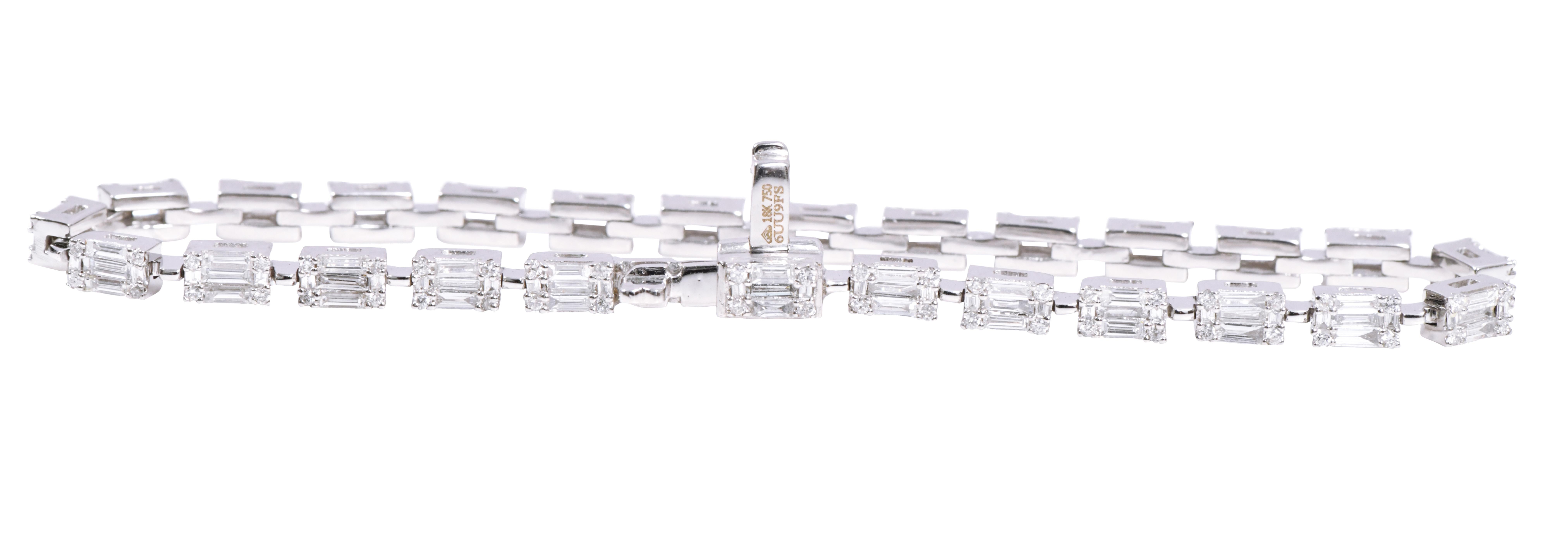 18 Karat White Gold 2.81 Carats Diamond Tennis Bracelet

When it comes to jewelry, we can never be specific as our heart always wants the most of it. Every piece of  jewelry has it’s own charm but one thing that remains constant and rather keeps