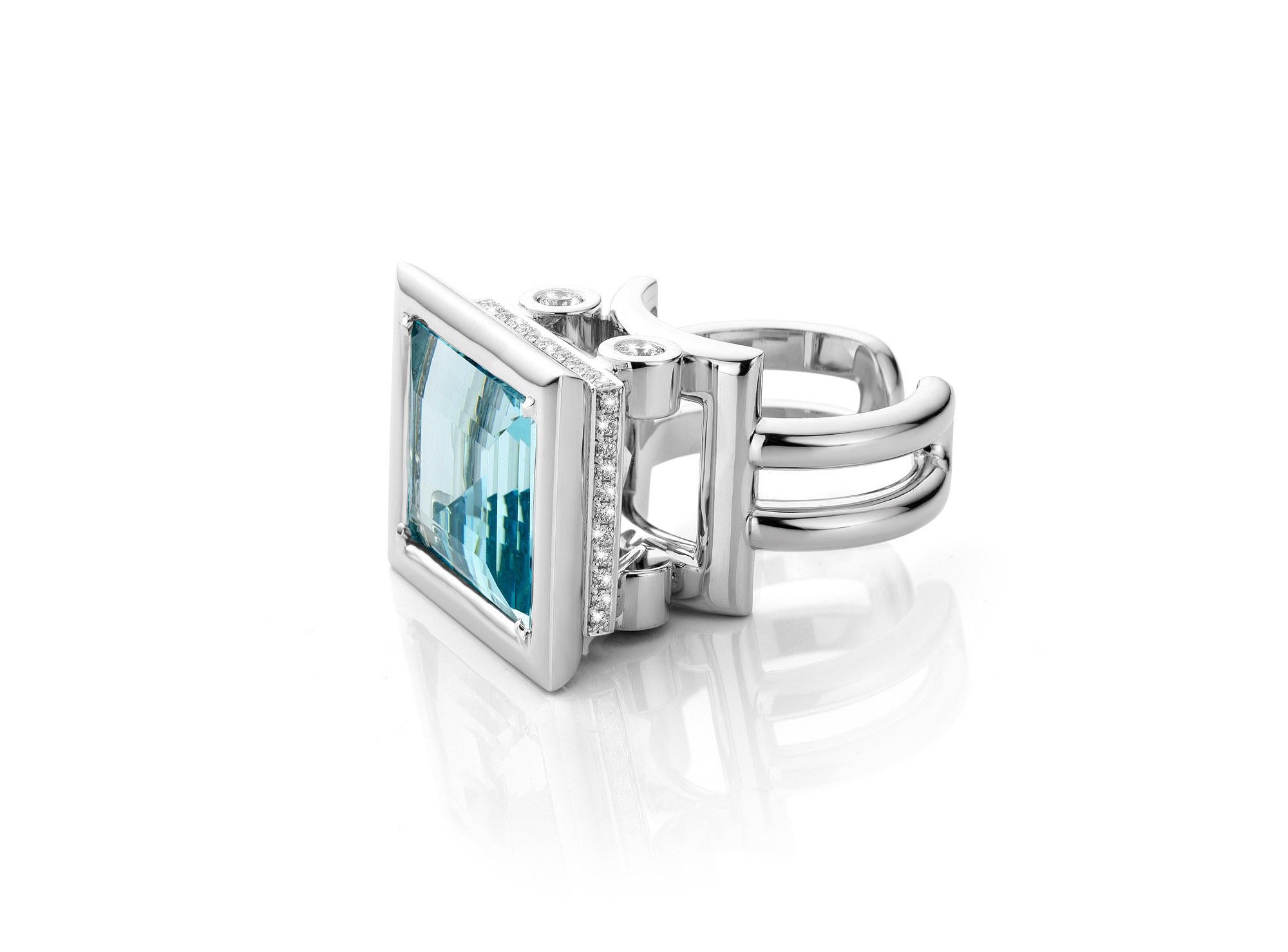 18 Karat White gold Cocktail Ring featuring a 28,4 carat Aquamarine stone.

Assher cut measuring 15,2 x 19,7 mm.
The Aquamarine Ring is set with 1,03 Carat Collection grade White Diamonds.

This is a one of a kind design made by Jochen Leën.
This