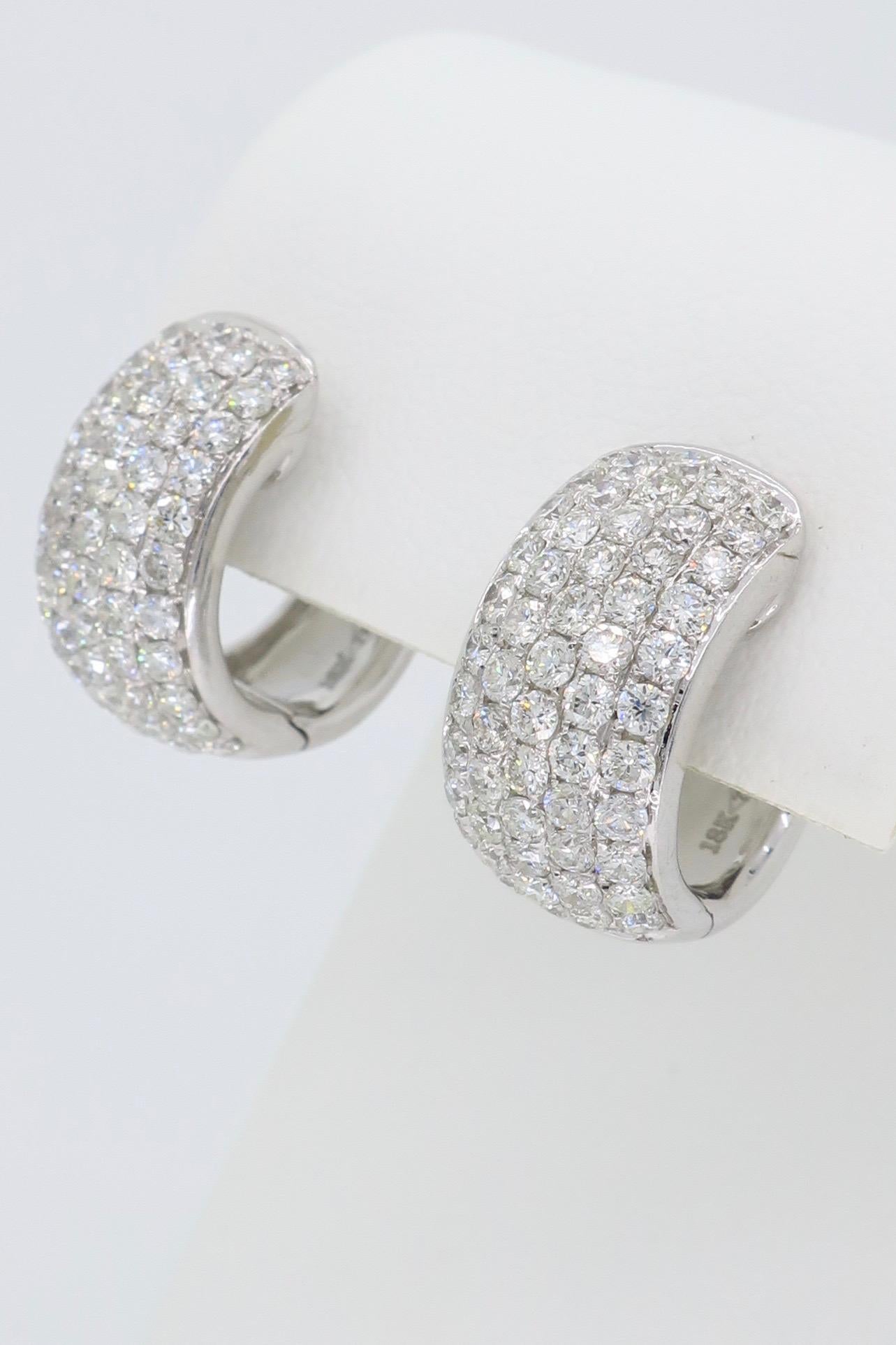 These beautiful hoops feature approximately 3.30CTW of Round Brilliant Cut Diamonds.

Diamond Carat Weight: Approximately 3.30CTW
Diamond Cut: 112 Round Brilliant Cut Diamonds
Color: Average G-I
Clarity: Average VS-SI
Metal: 18K White