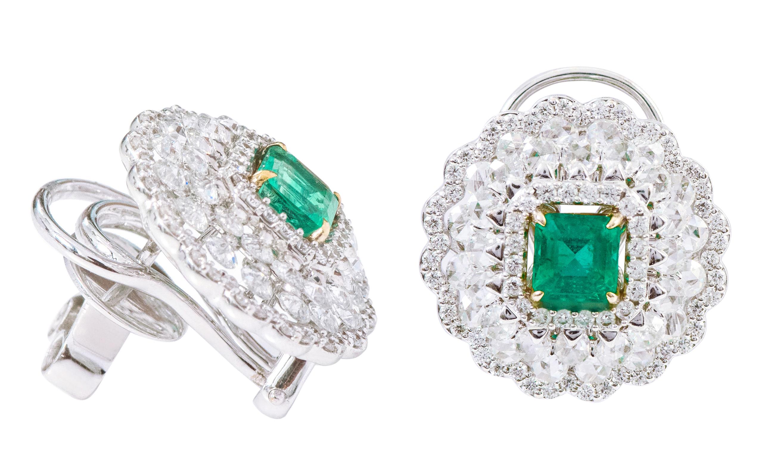 18 Karat White Gold 3.37 Carat Natural Emerald and Diamond Stud Earrings

This magnificent vivid green emerald and diamond rose-cut earring is fascinating. The earring sets itself apart with the exquisite solitaire emerald cut emerald surrounded by