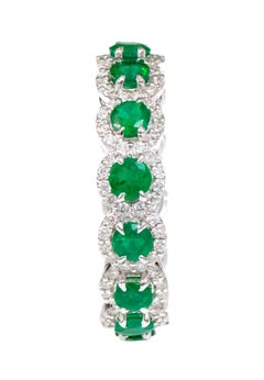 18 Karat White Gold 3.39 Carat Emerald and Diamond Cluster Eternity Band Ring