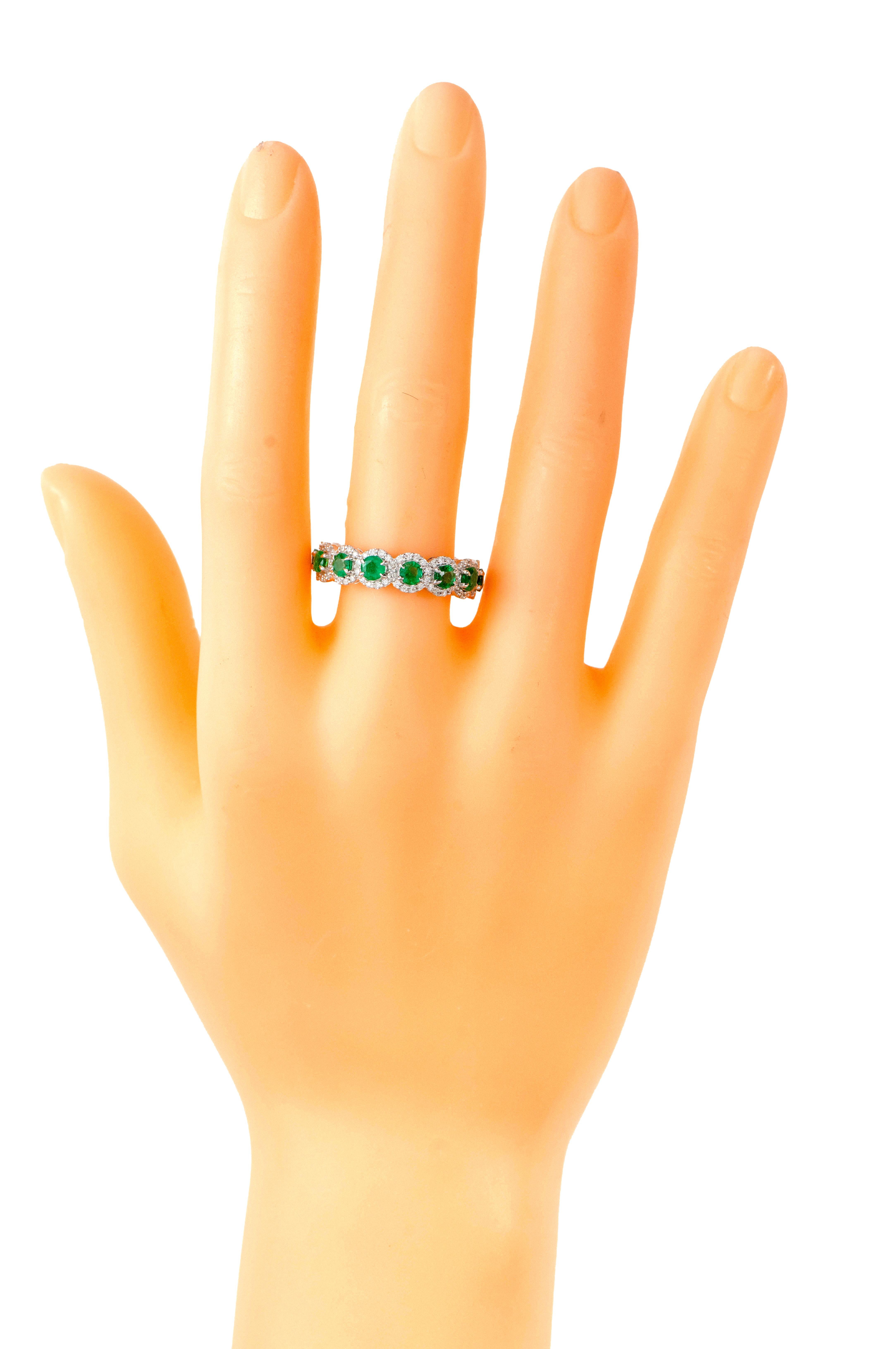 Contemporary 18 Karat White Gold 3.39 Carat Emerald and Diamond Cluster Eternity Band Ring For Sale