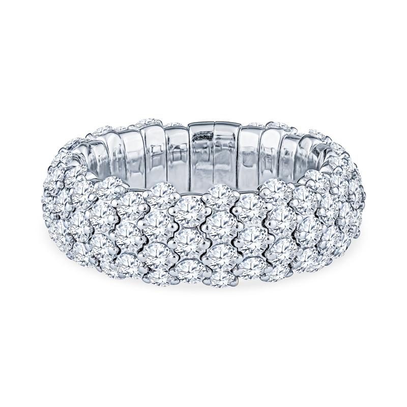 This unique stretch ring is crafted in 18 karat white gold and features 3.75 carat total weight in round diamonds. It is comfortable and easy to slip on and off with its expanding stretch action. It is a size 6-6.5 but can stretch. 
Diamond Quality: