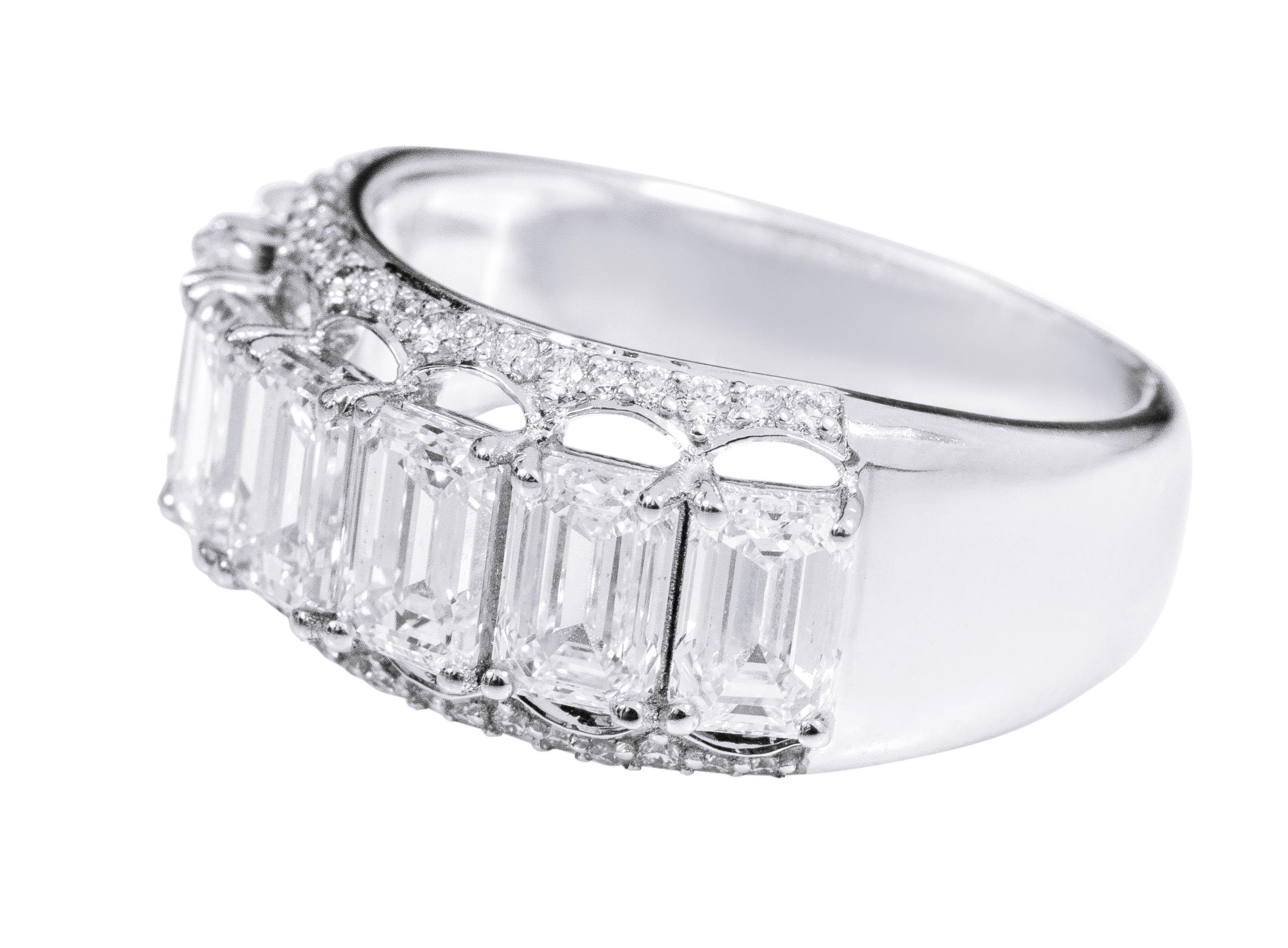 18 Karat White Gold 3.83 Carat Solitaire Emerald-Cut Diamond Half-Band Ring

This excellent diamond solitaire band is timeless. The eternity diamond half-band is elegantly set with 7 identical size and matching emerald cut 0.50 pointer diamonds