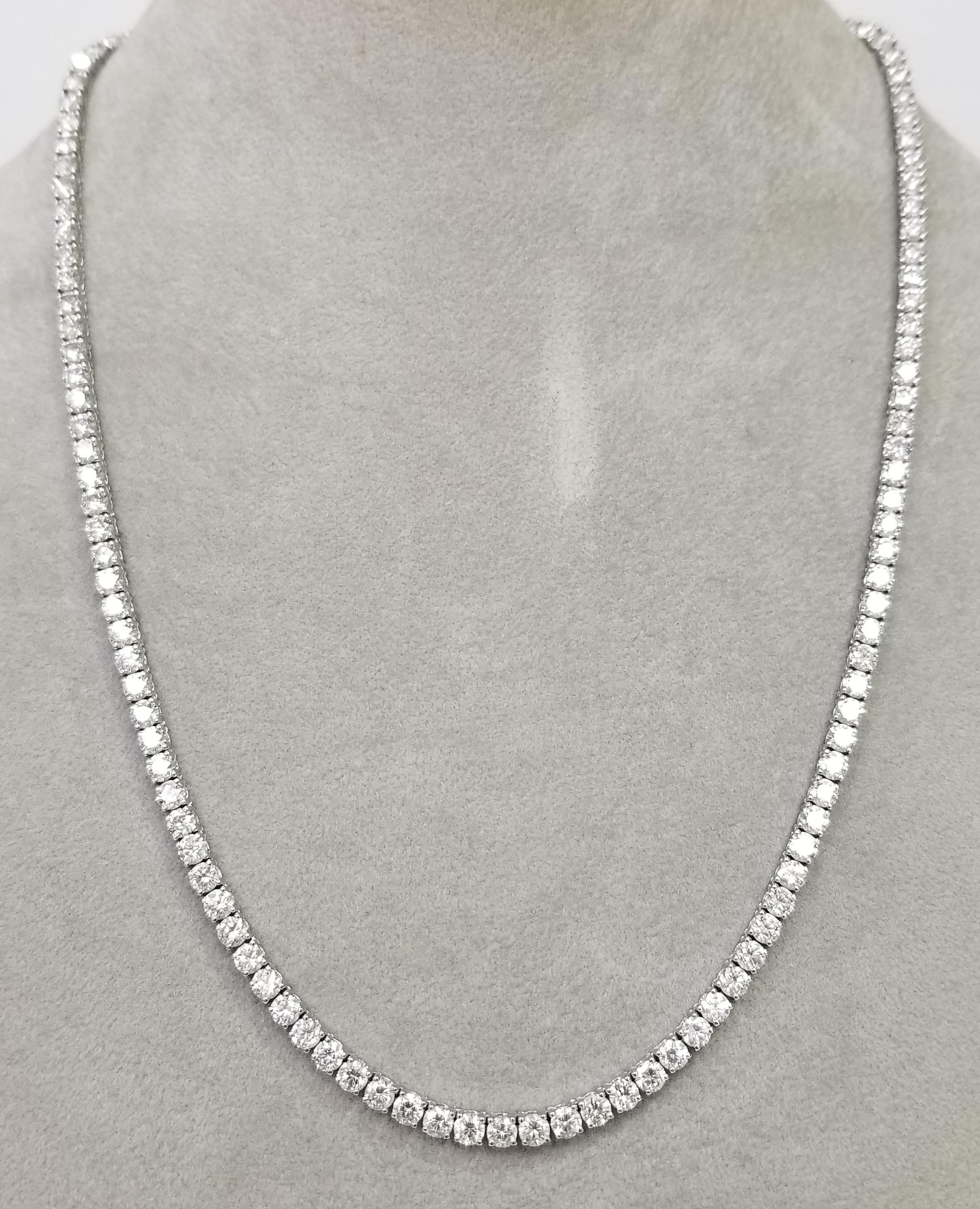 About
18k white gold 4 prong diamond necklace, containing 
 Specifications:
    main stone: ROUND CUT DIAMONDS
    diamonds: 136 PIECES
    carat total weight: 16.34cts.
    color: F-G
    clarity: VS1-2
    brand: custom
    metal:  18K GOLD
   