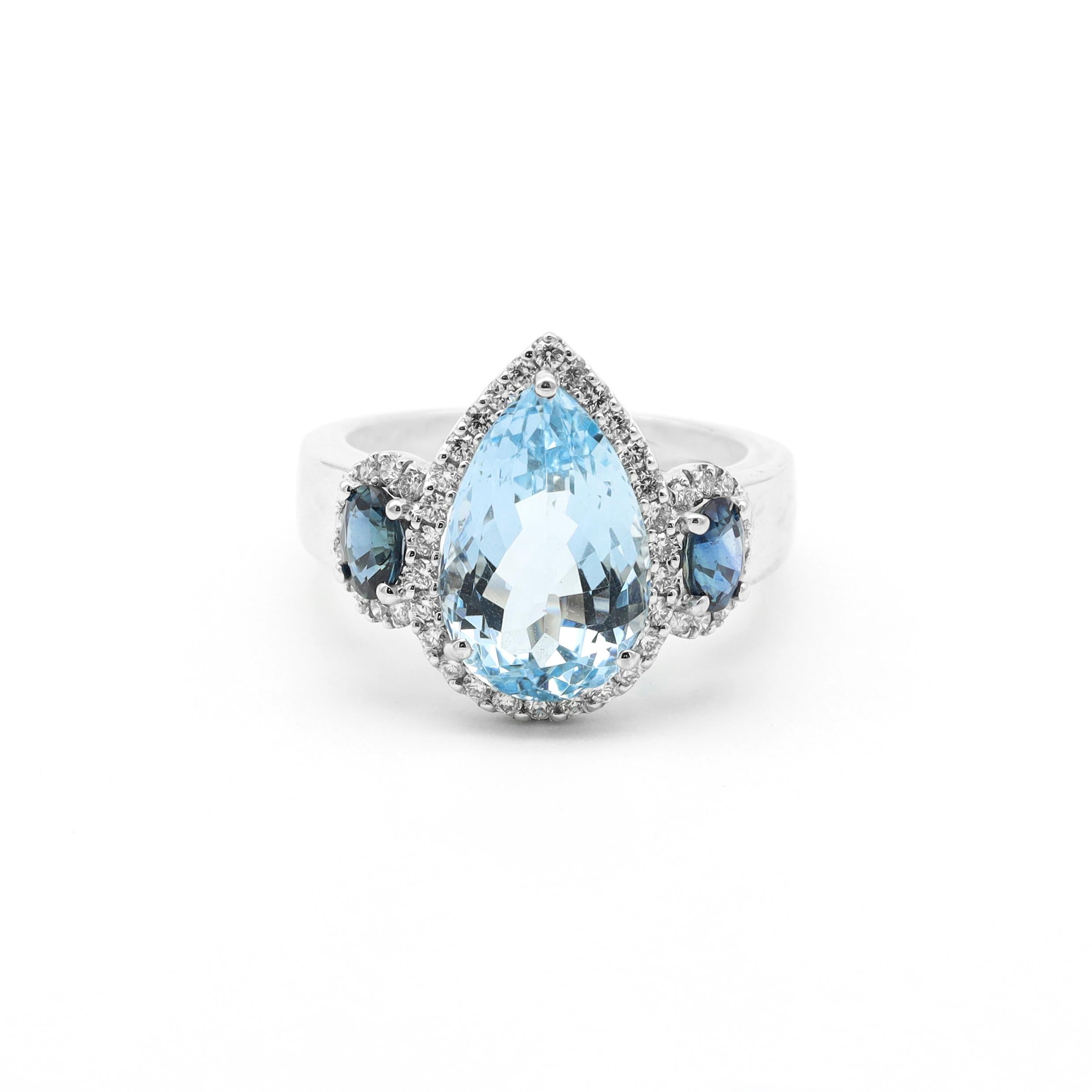 Pear Cut 18 Karat White Gold 4.44 Carat Aquamarine, Sapphire and Diamond Three Stone Ring For Sale