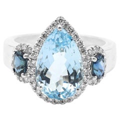 18 Karat White Gold 4.44 Carat Aquamarine, Sapphire and Diamond Three Stone Ring